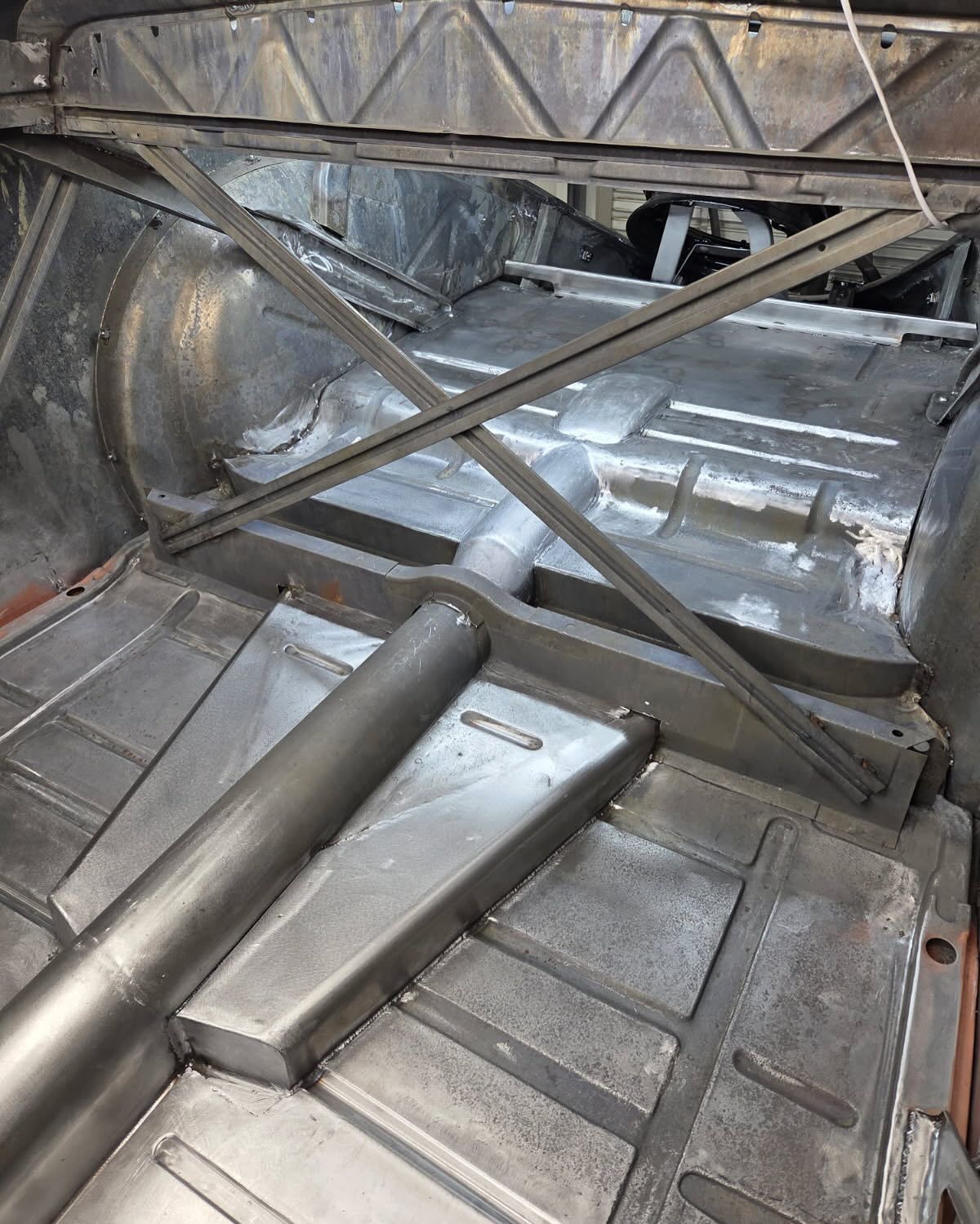 A close up of a metal structure in a car.