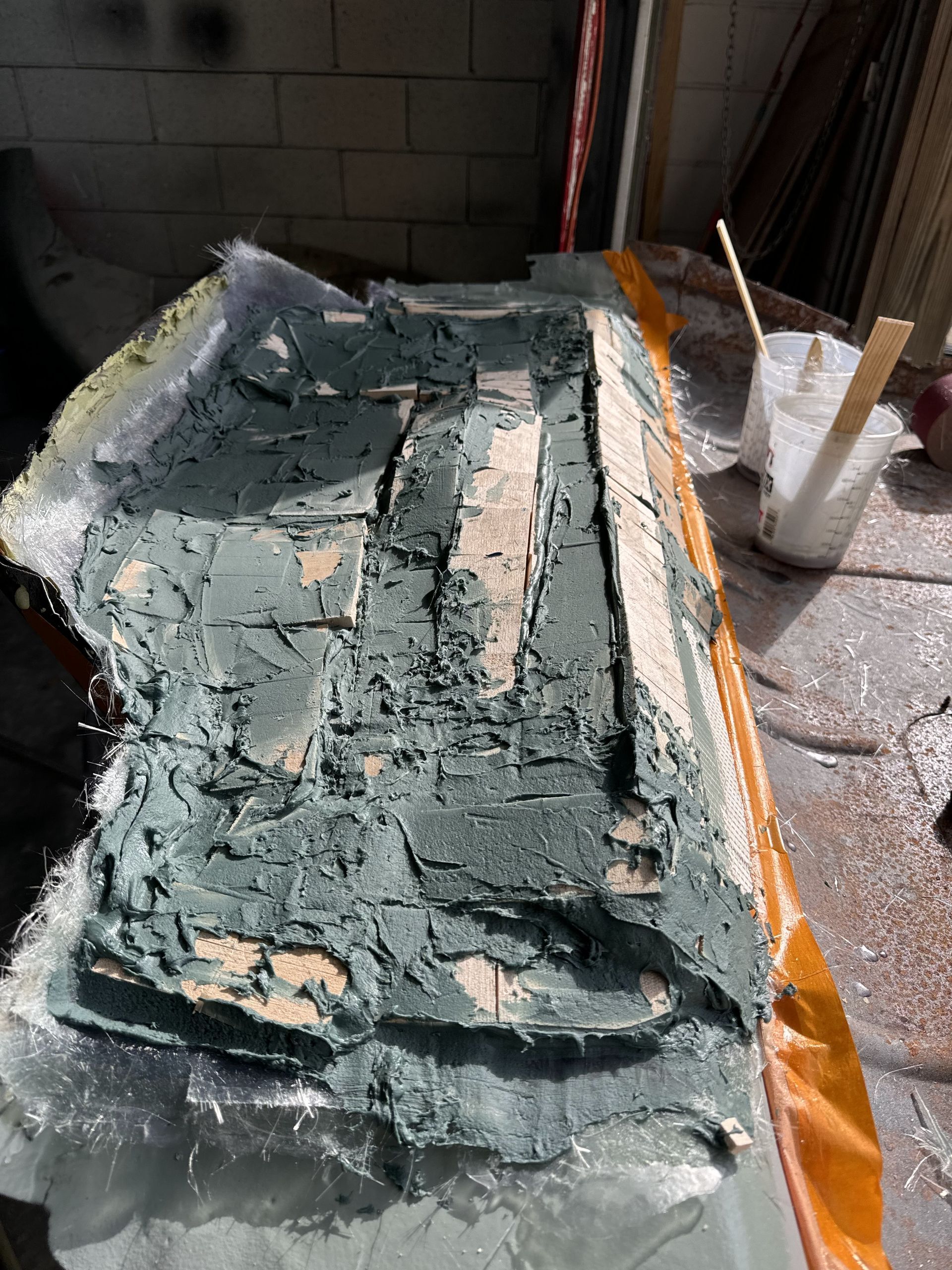 A piece of concrete is sitting on top of a table.