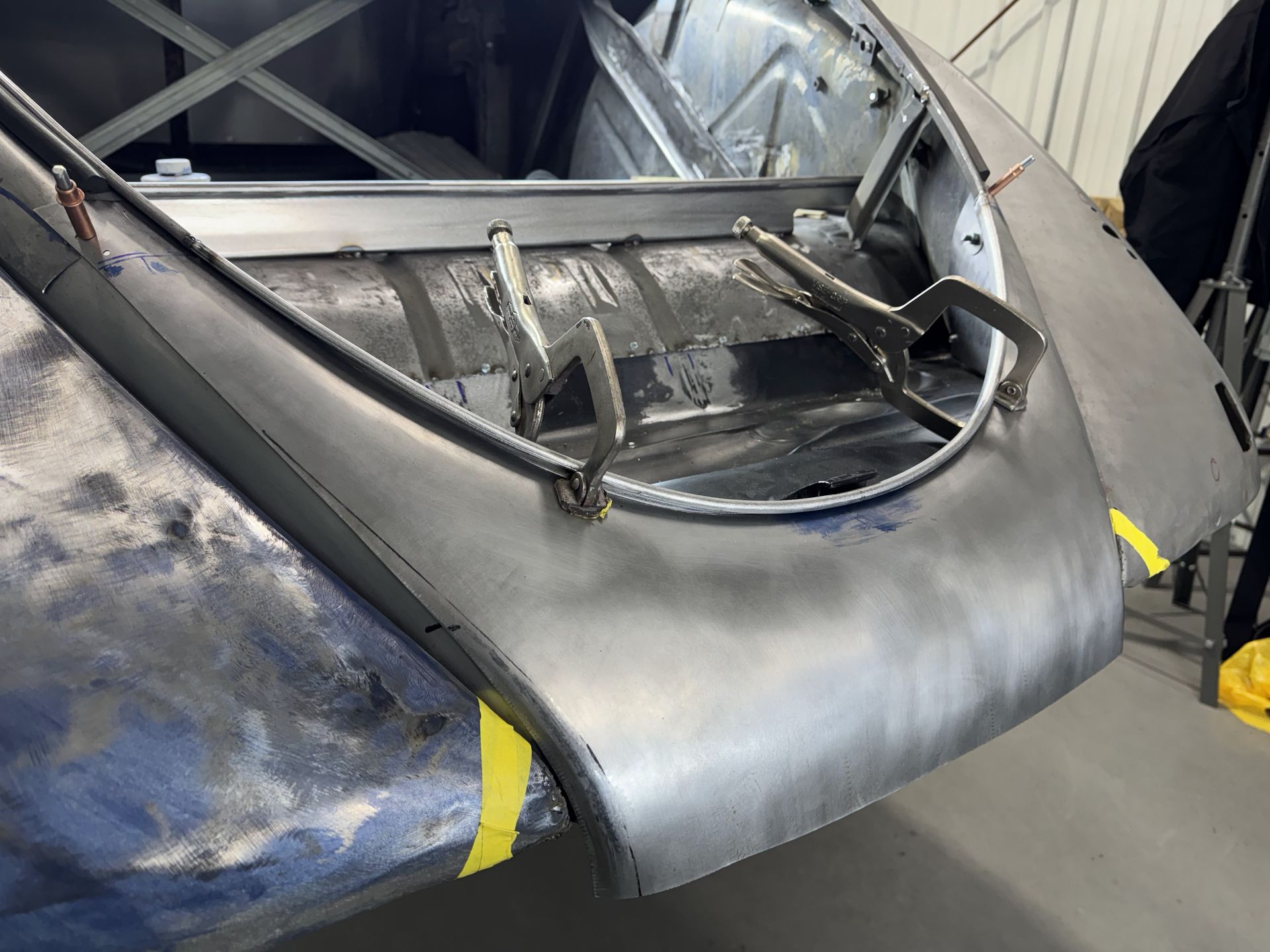 A close up of a car with the hood open