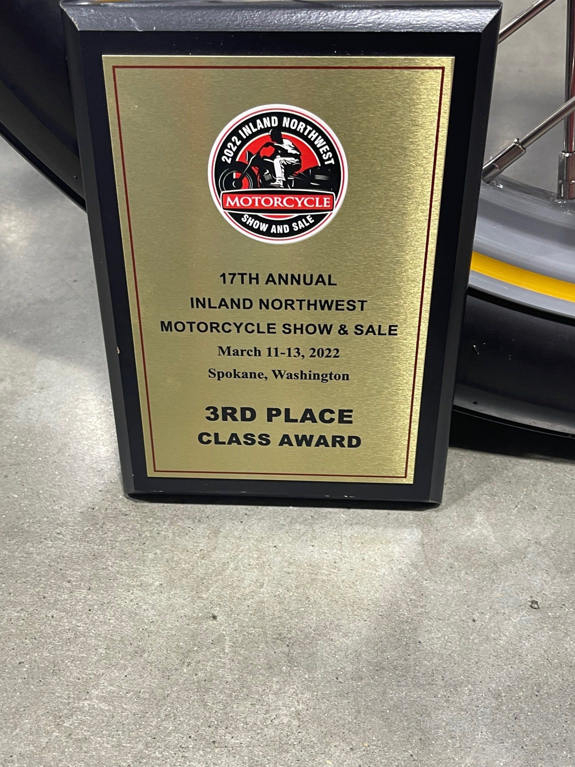 A plaque for the 17th annual inland northwest motorcycle show and sale