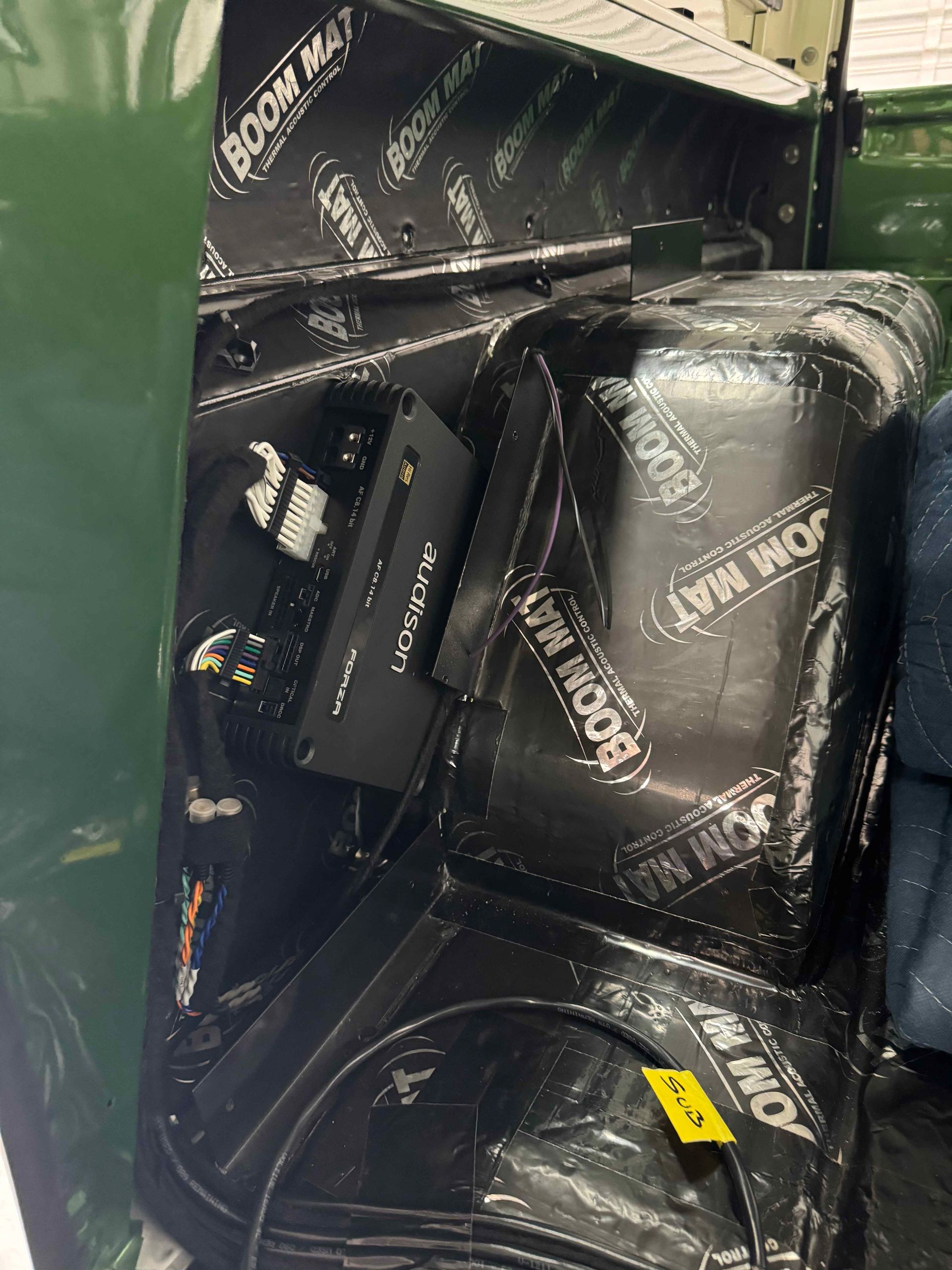 A room mat is sitting on top of a chair in a room.