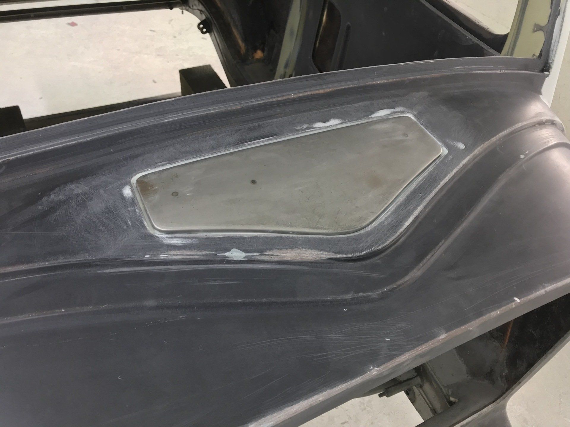 A close up of a piece of metal with a hole in it.