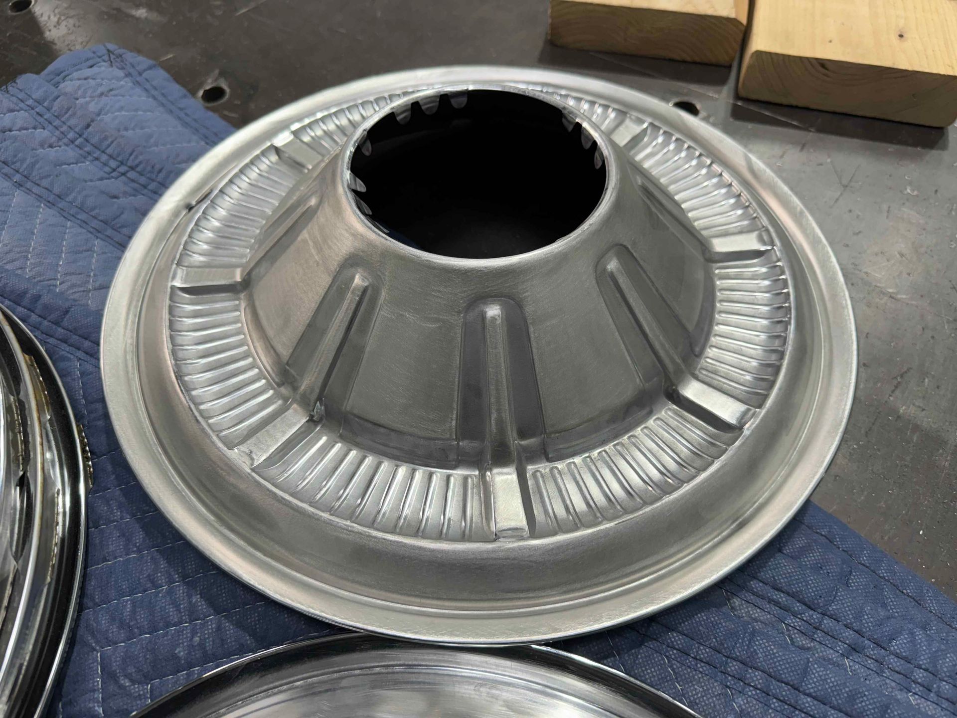 A close up of a metal object with a hole in the middle