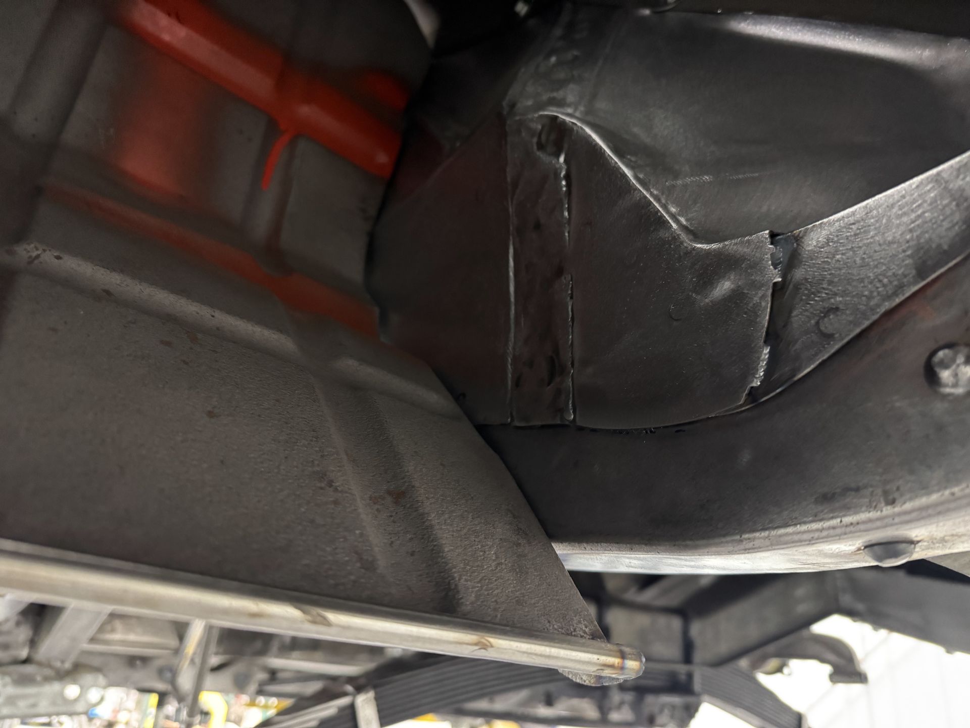 A close up of the underside of a car.