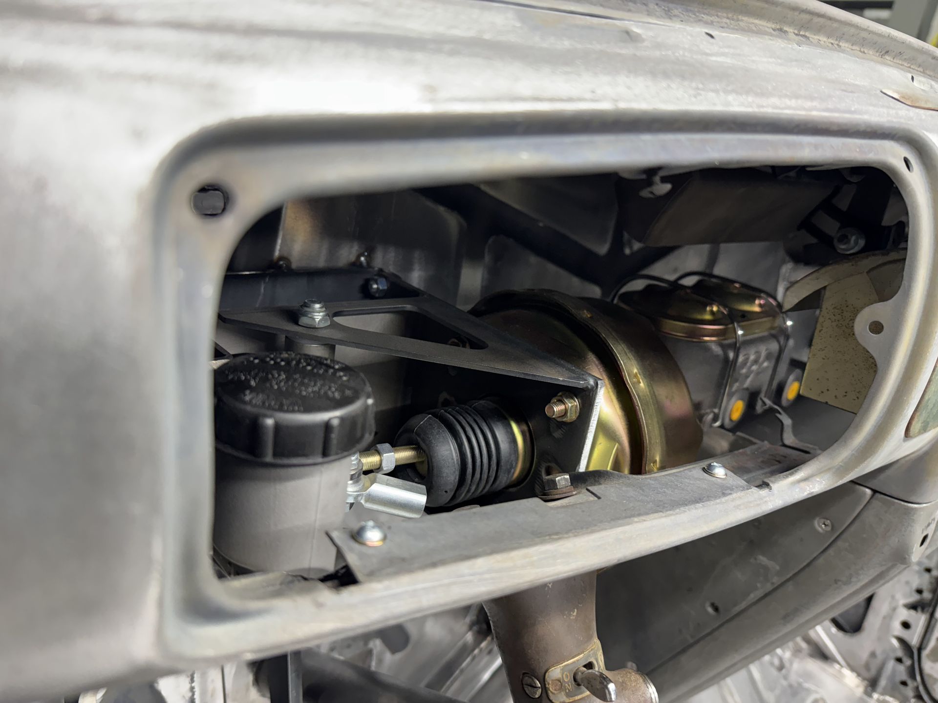 A close up of a brake system in a car.