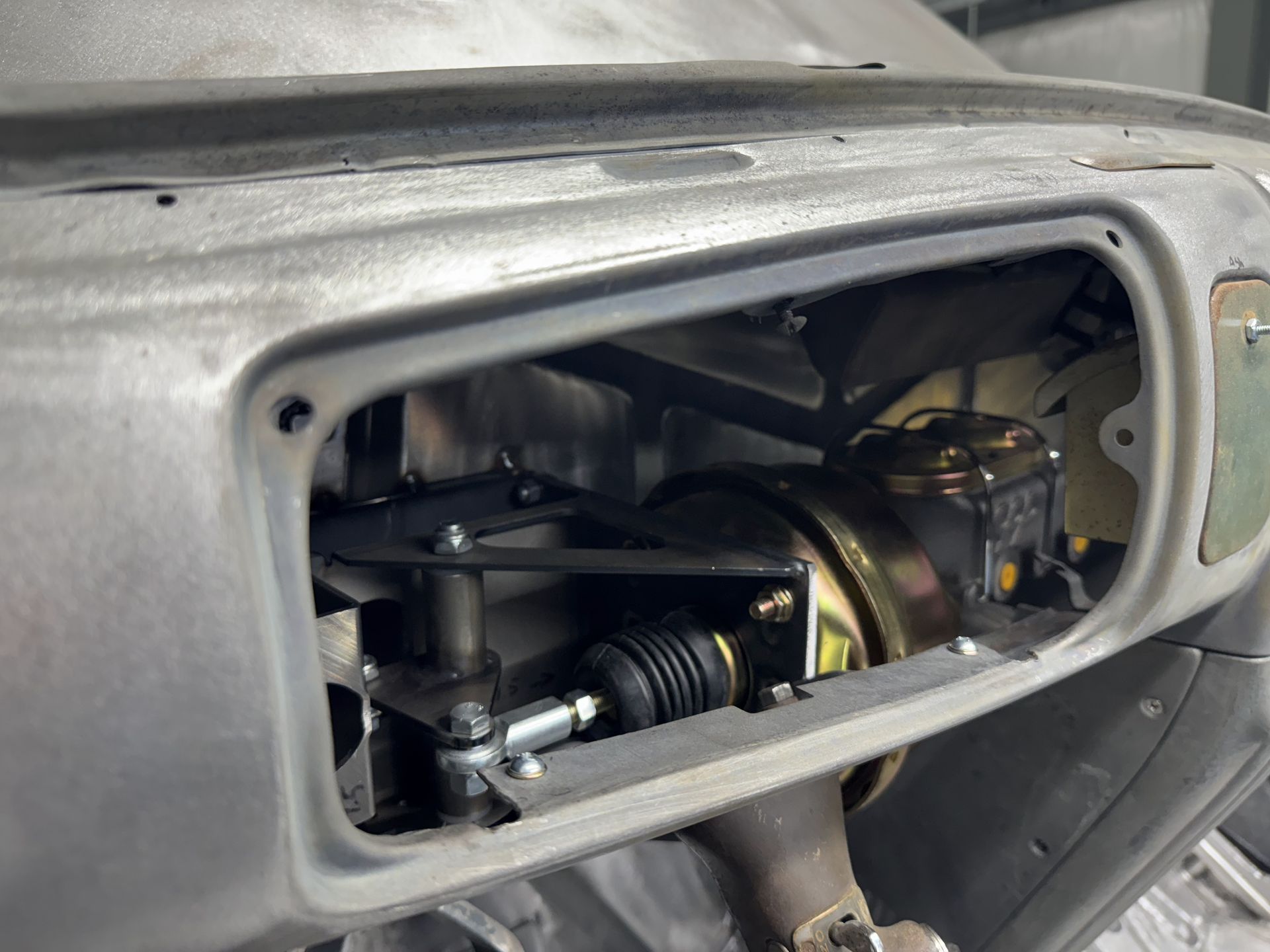 A close up of a brake system in a car.