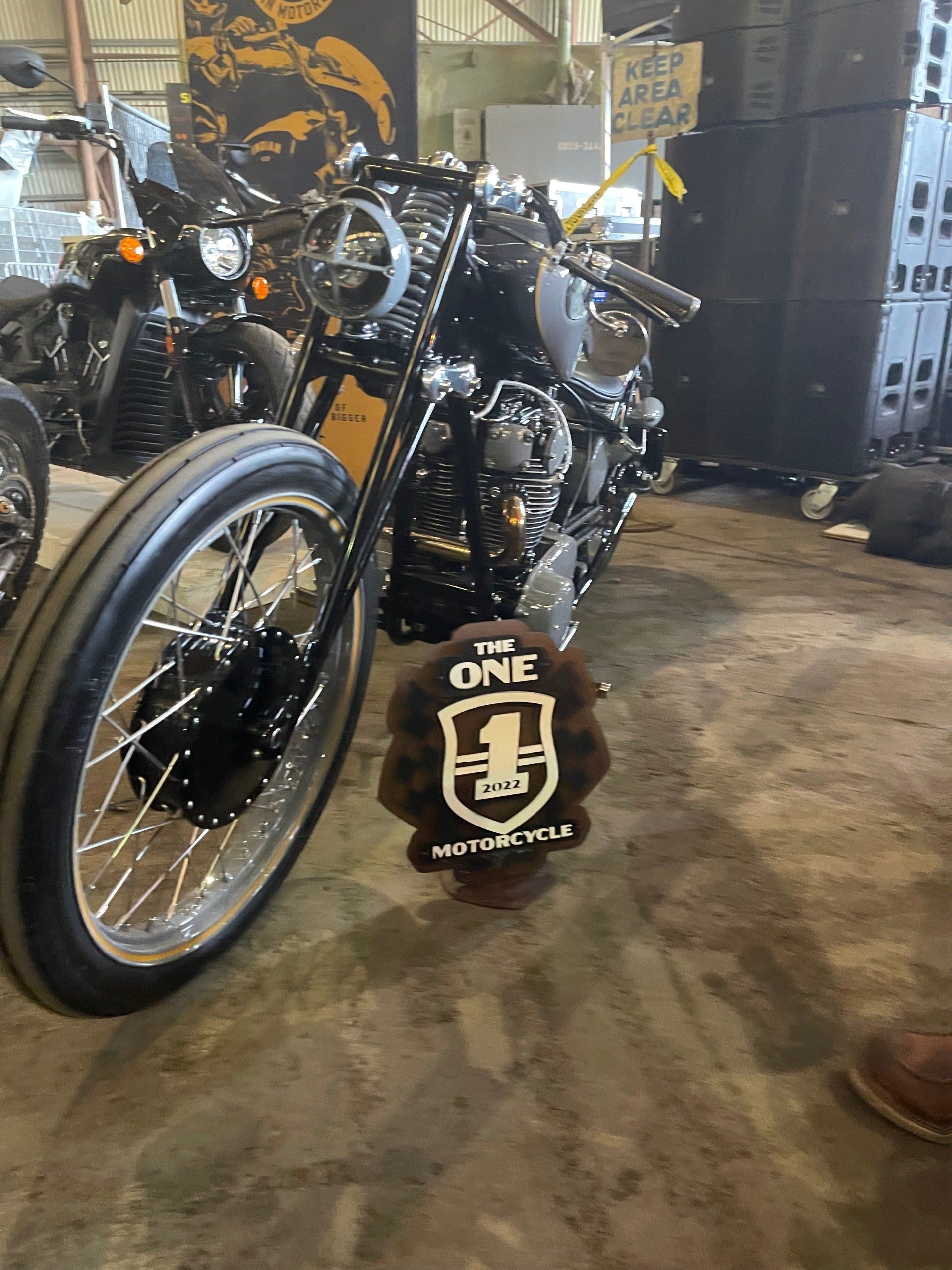 A motorcycle with a patch that says one on it