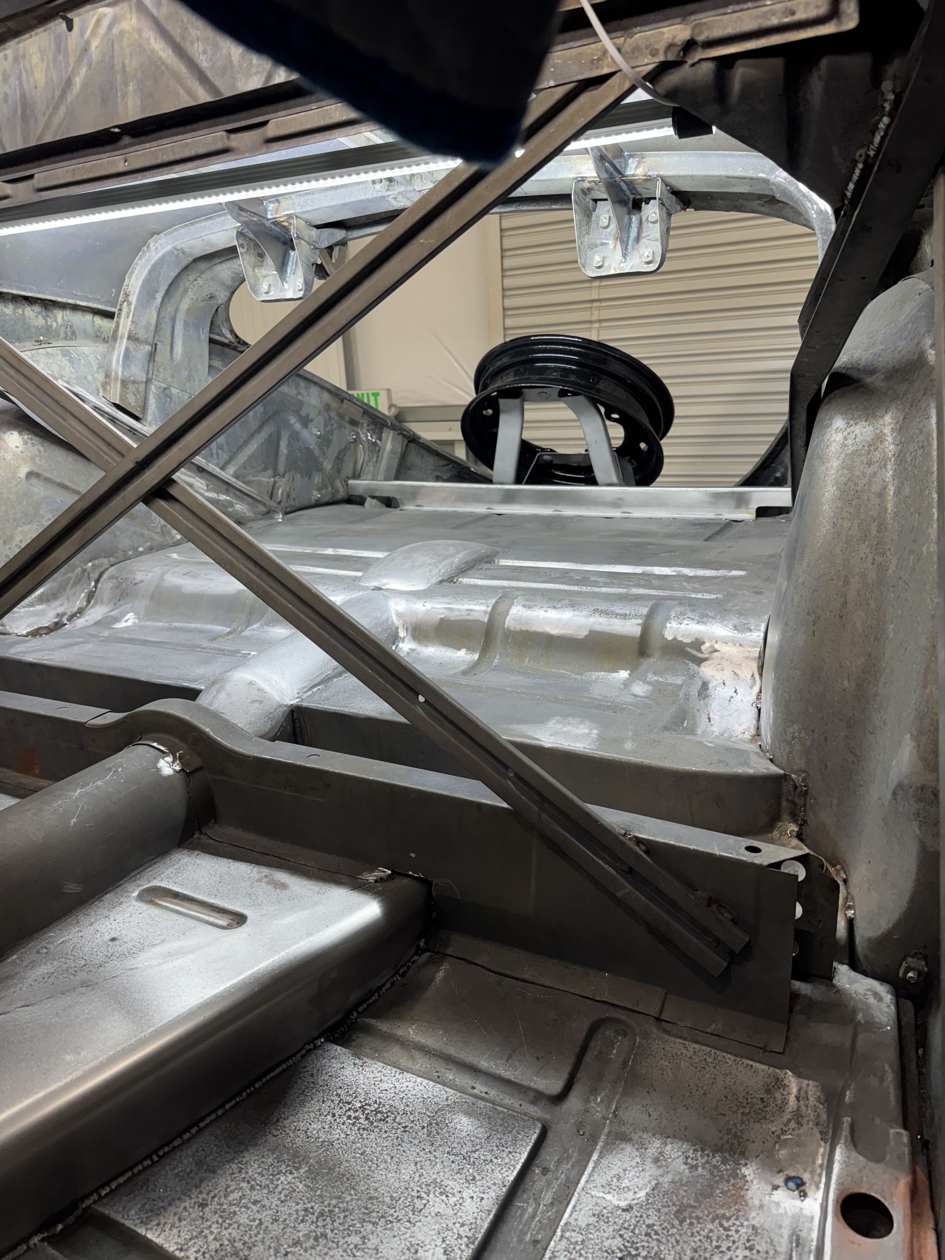 The inside of a car with a roof that is being built