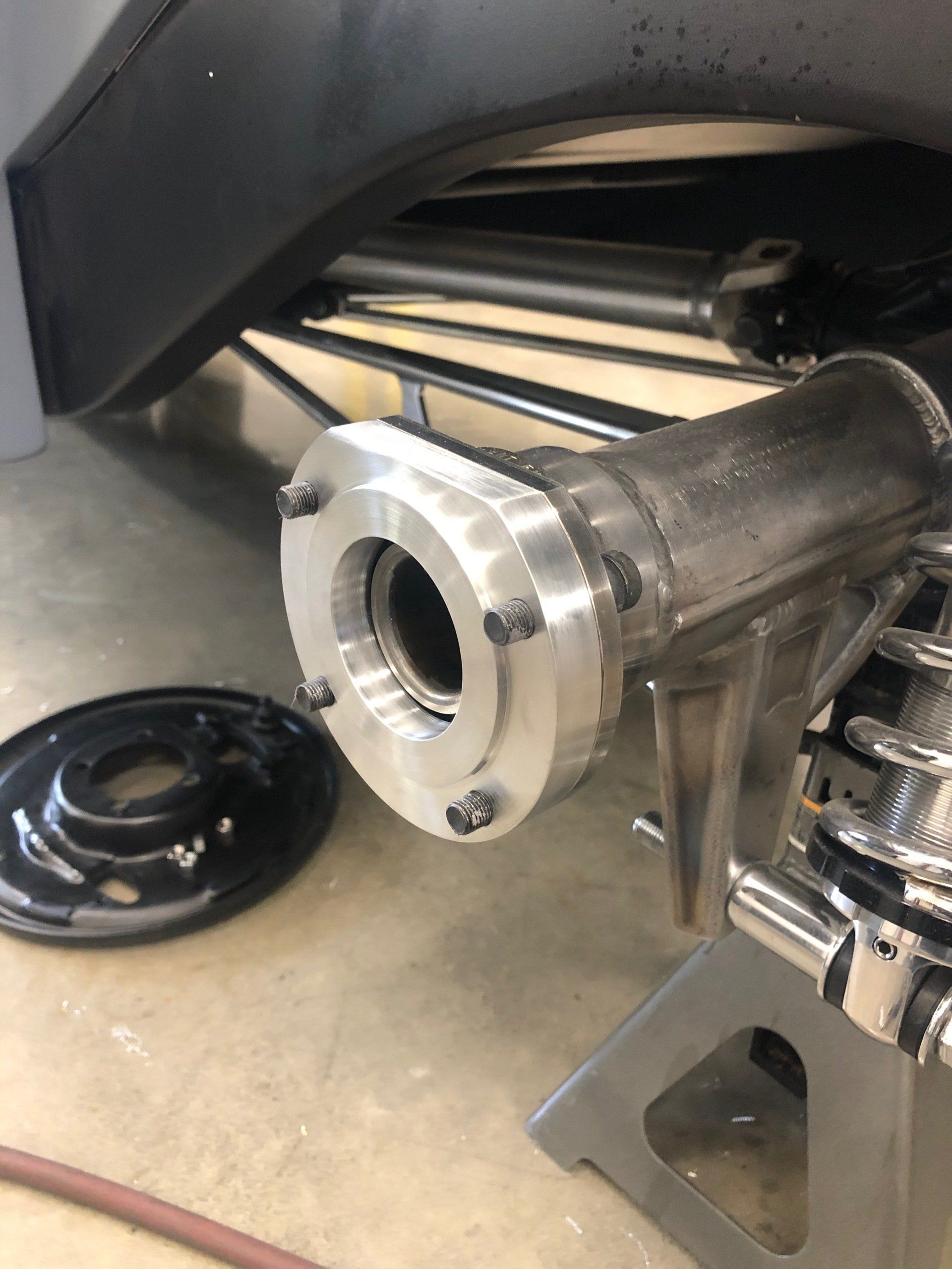 A close up of a metal object sitting on top of a table.