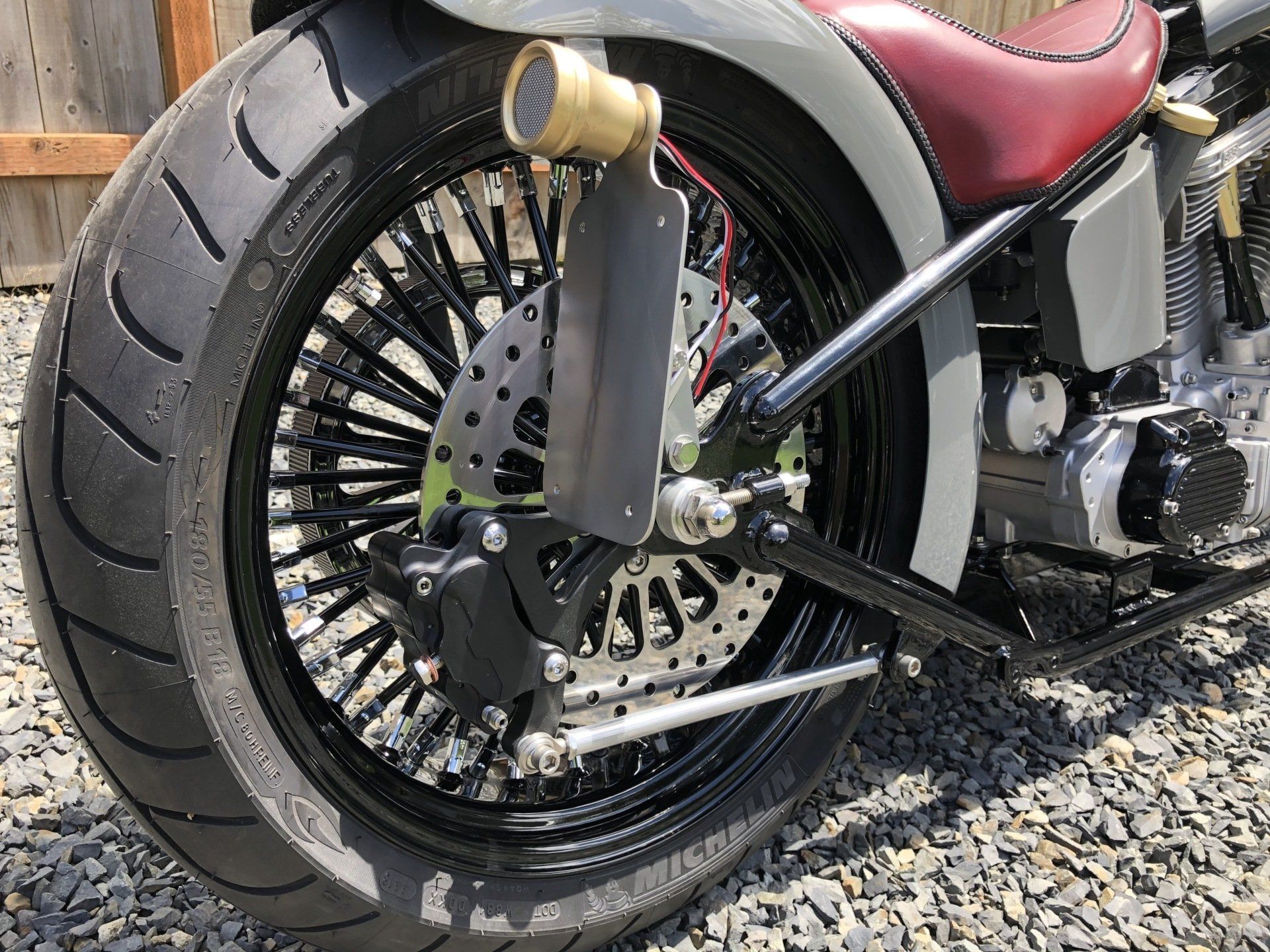 A close up of the front wheel of a motorcycle