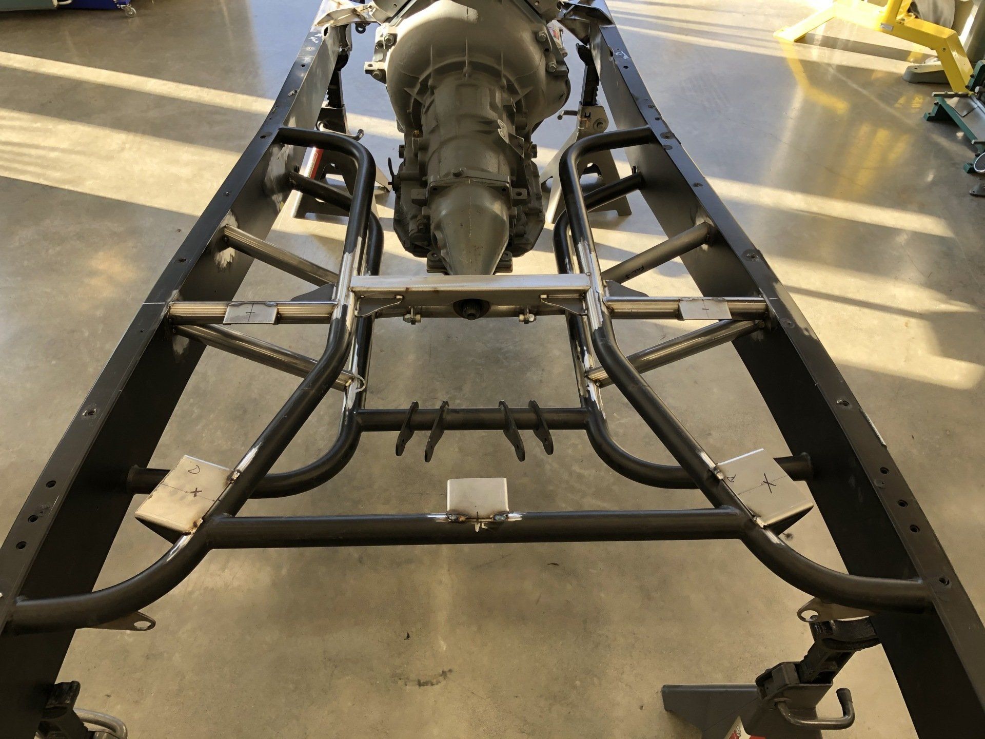 A metal frame with a gearbox attached to it