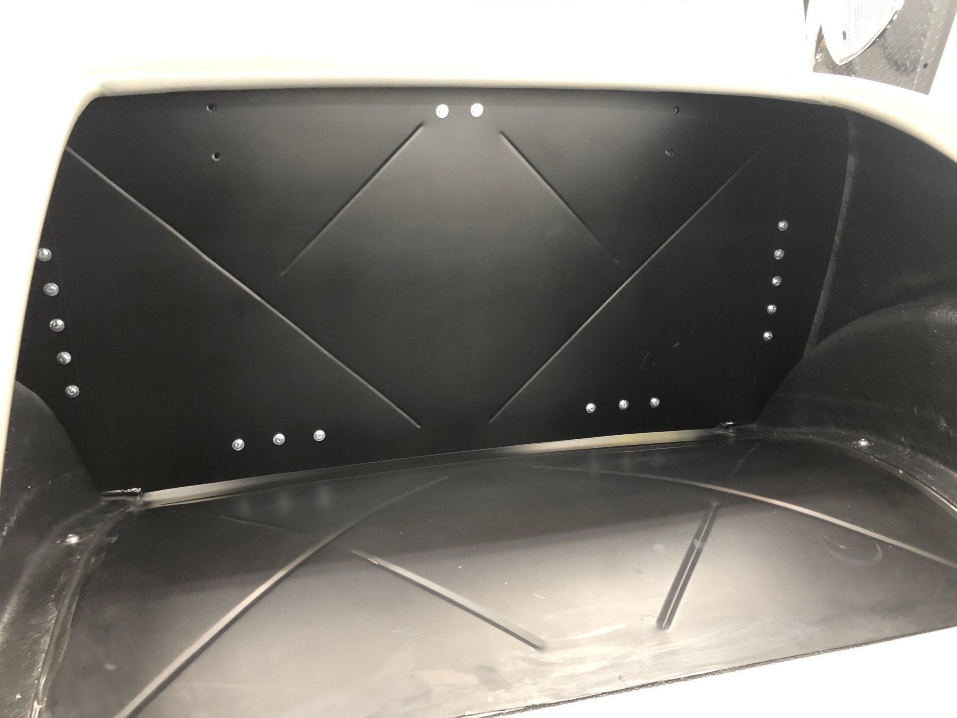 A close up of a black box with holes in it