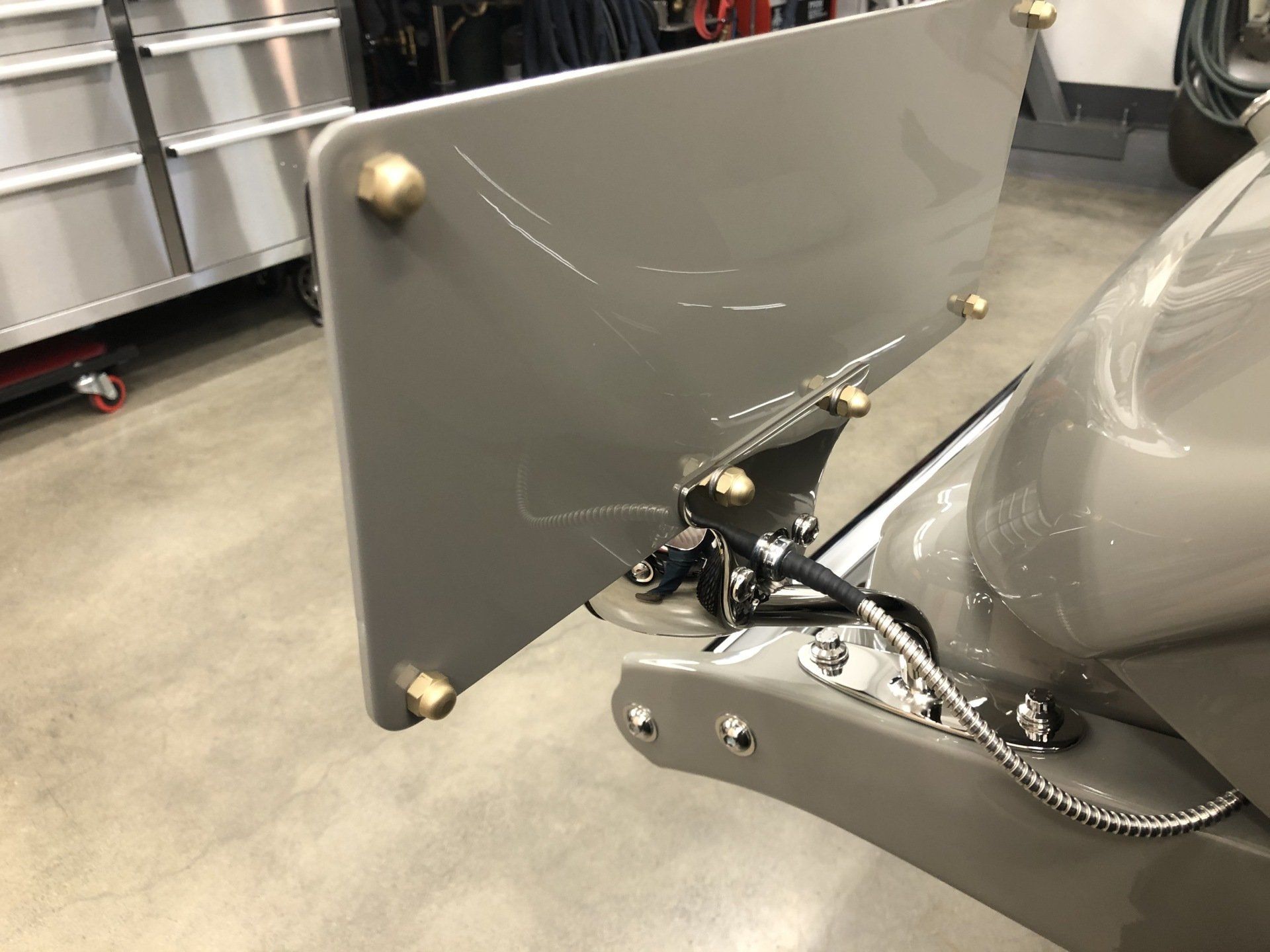 A close up of a trailer with a plate on it