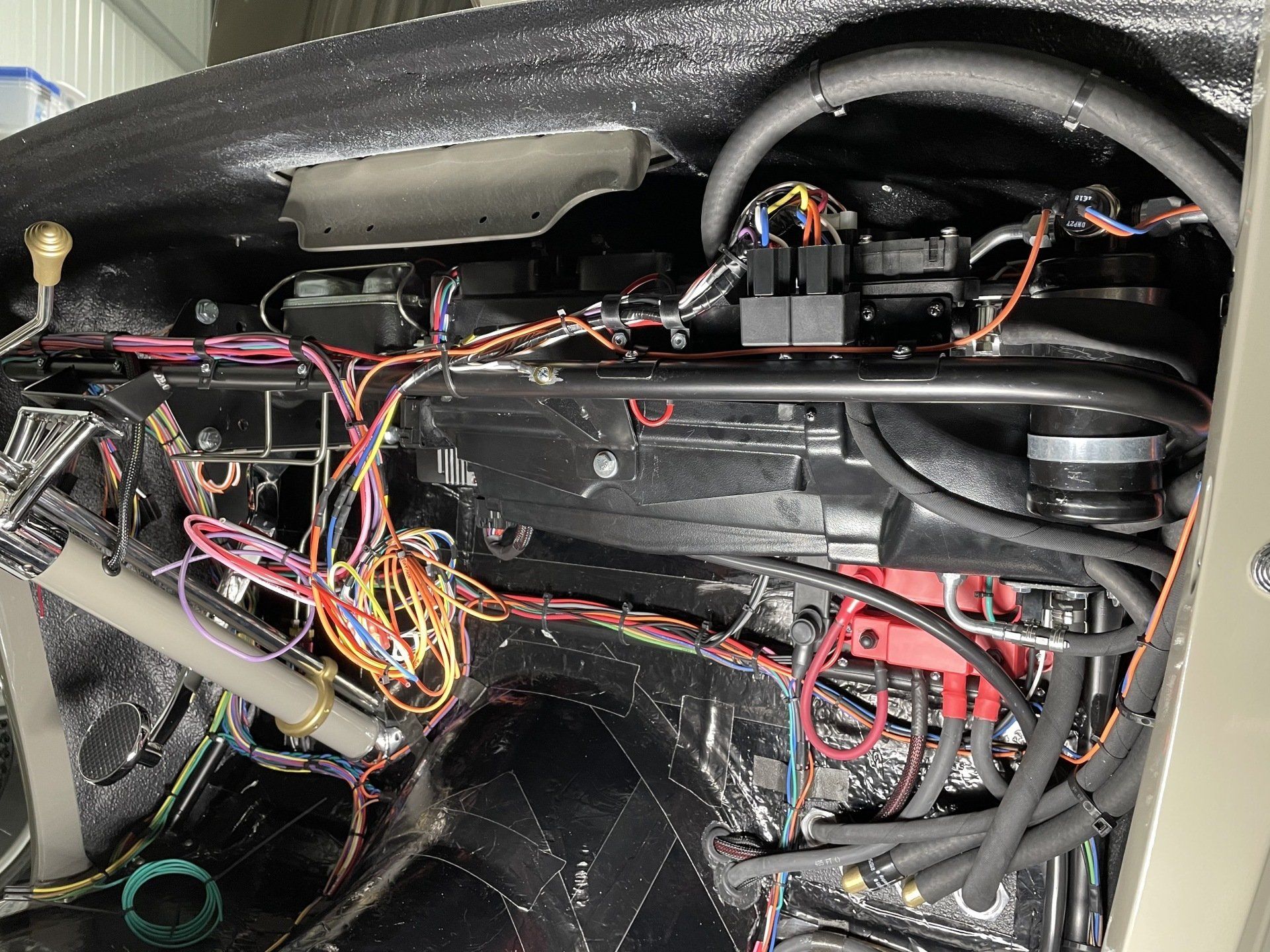 A car with a lot of wires coming out of it