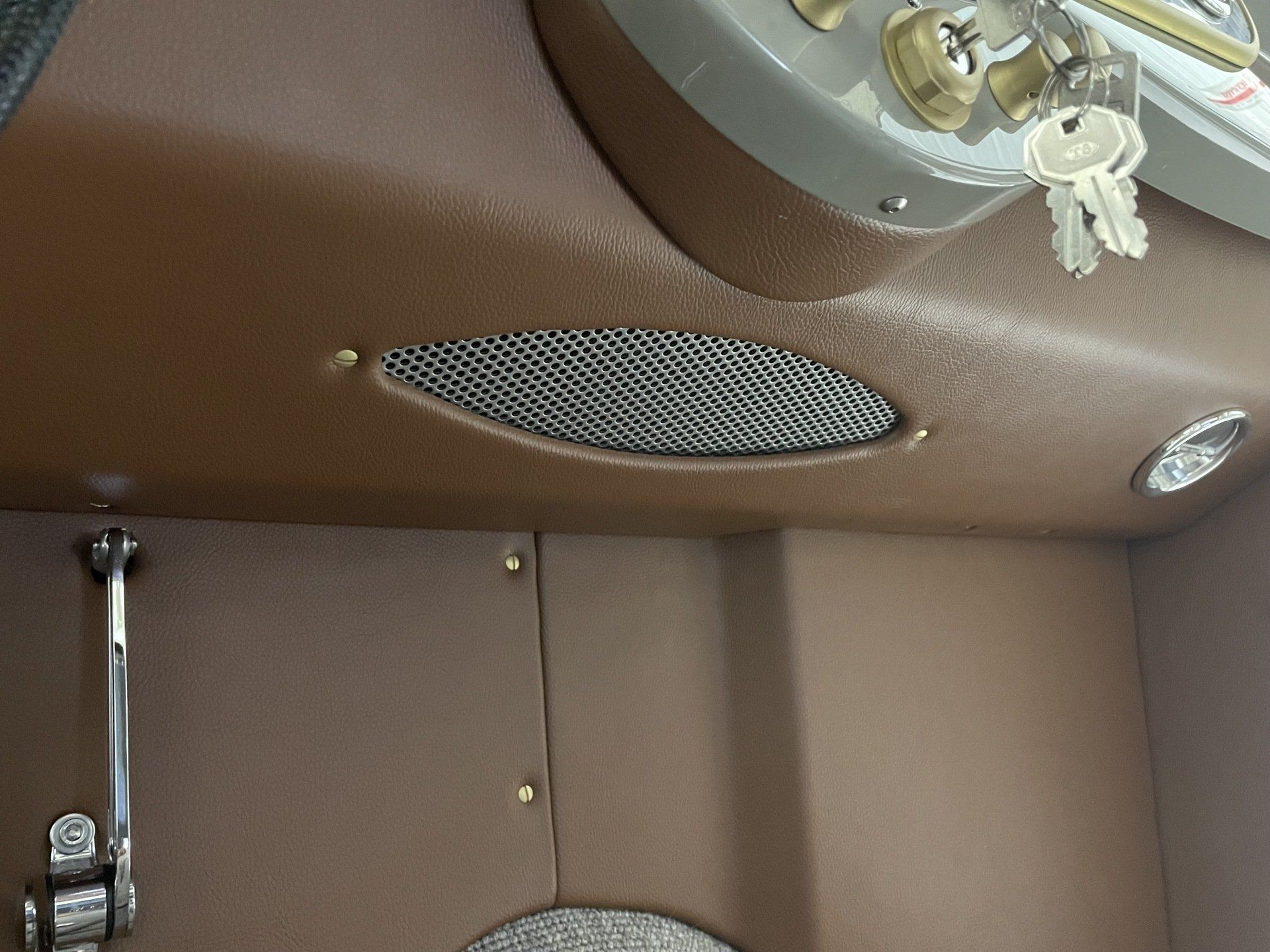 A pair of keys hanging from the ceiling of a room