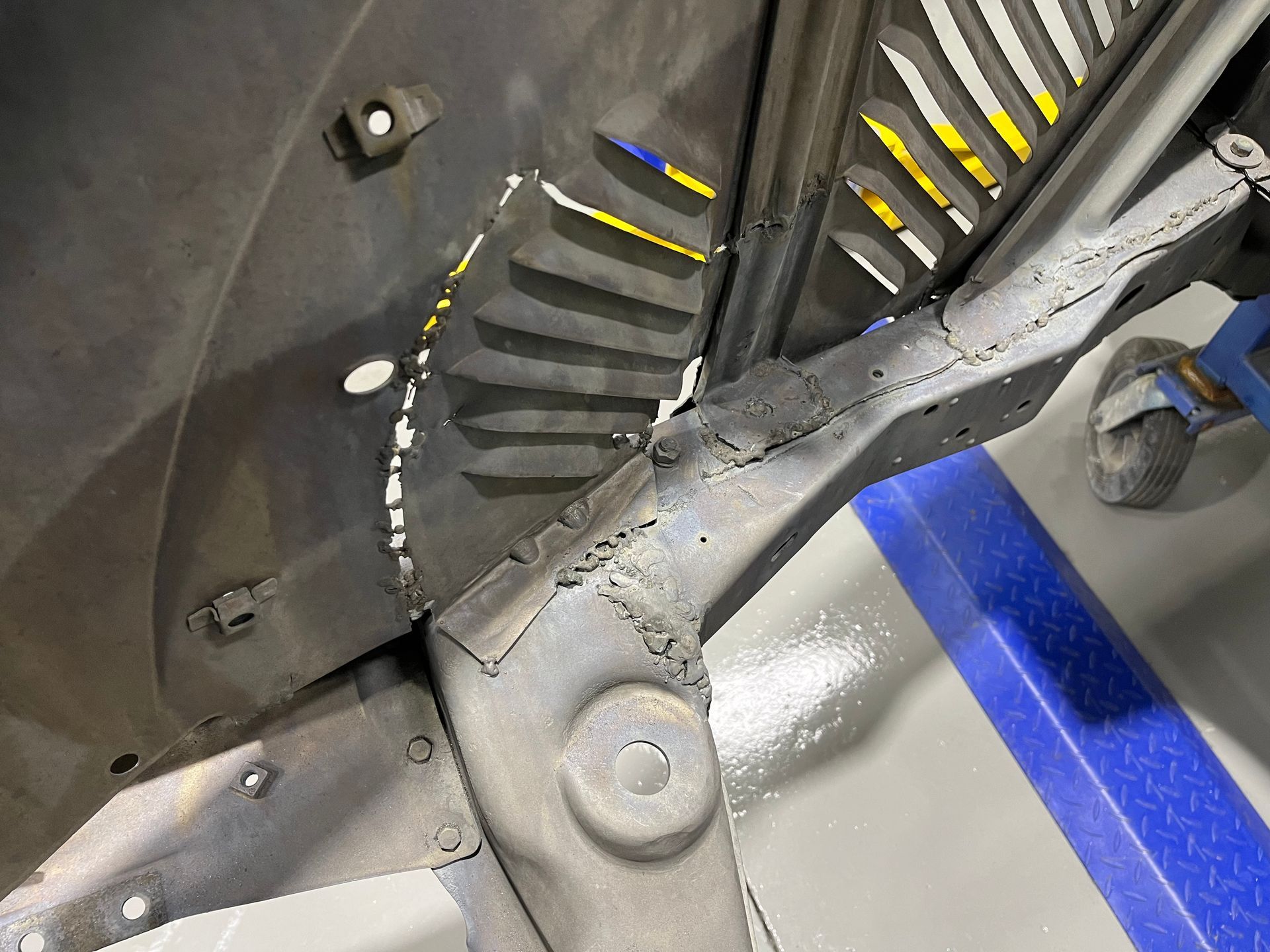 A close up of a piece of metal with a hole in it.