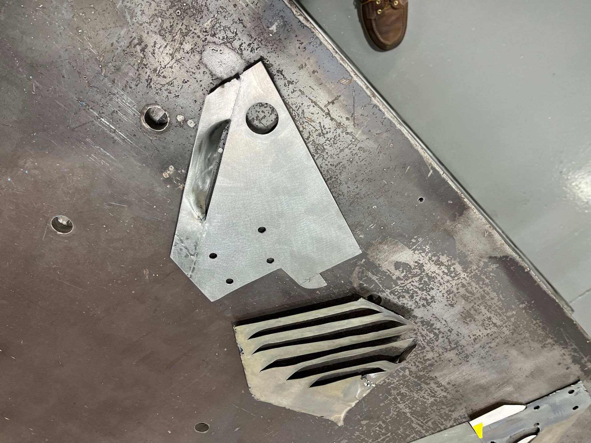 A piece of metal is sitting on top of a table