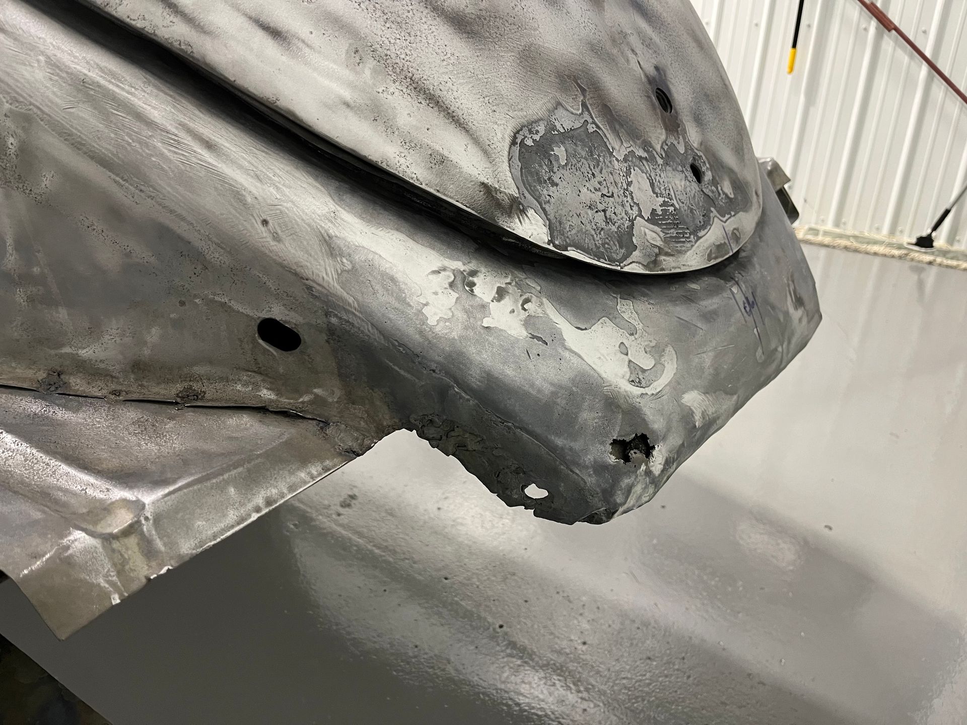 A close up of a piece of metal on a table.