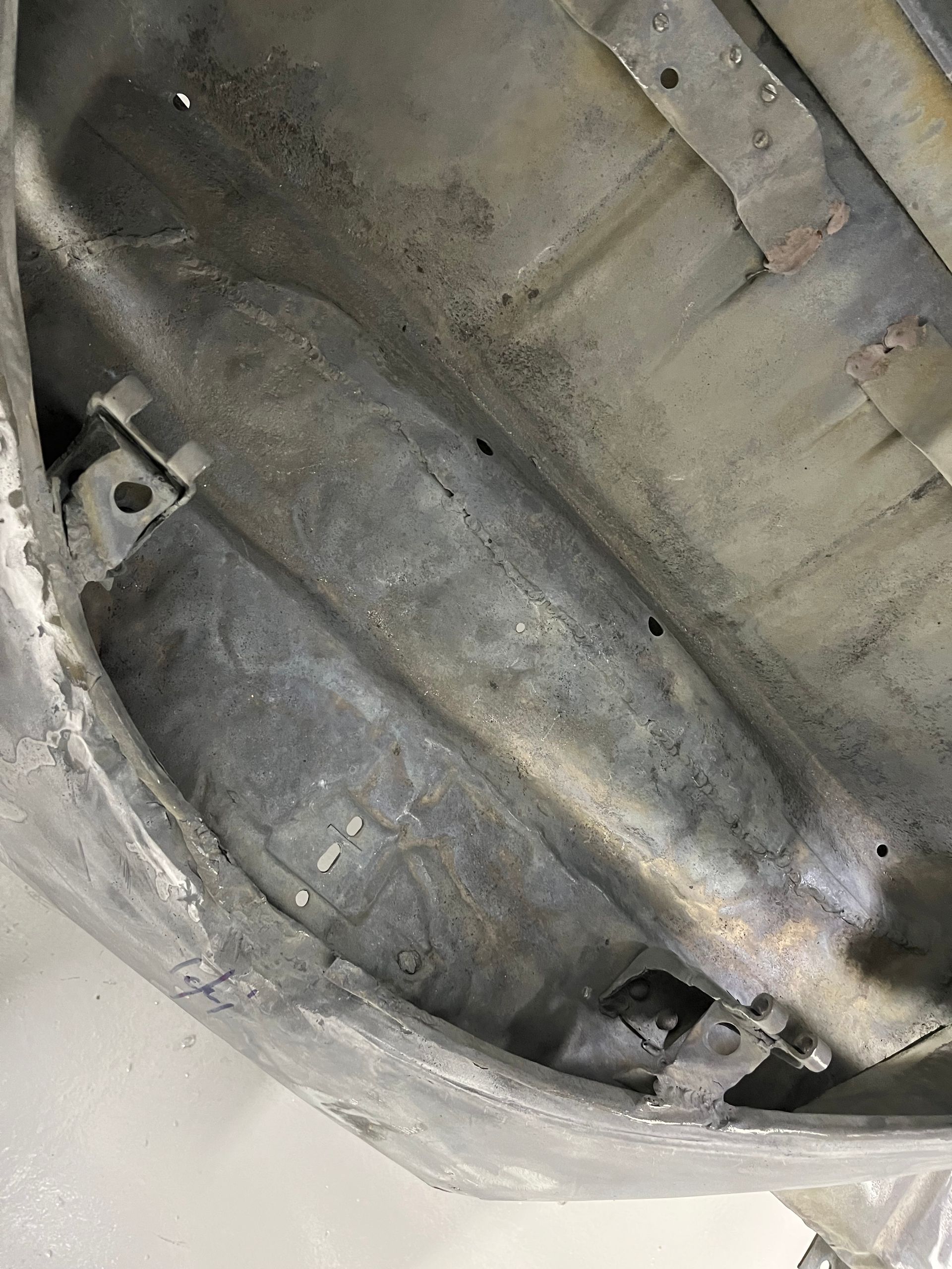 A close up of the underside of a car.