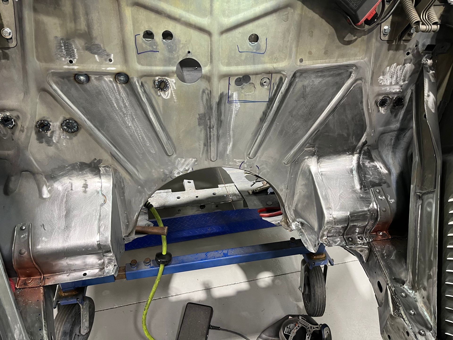 A close up of the inside of a car being worked on.