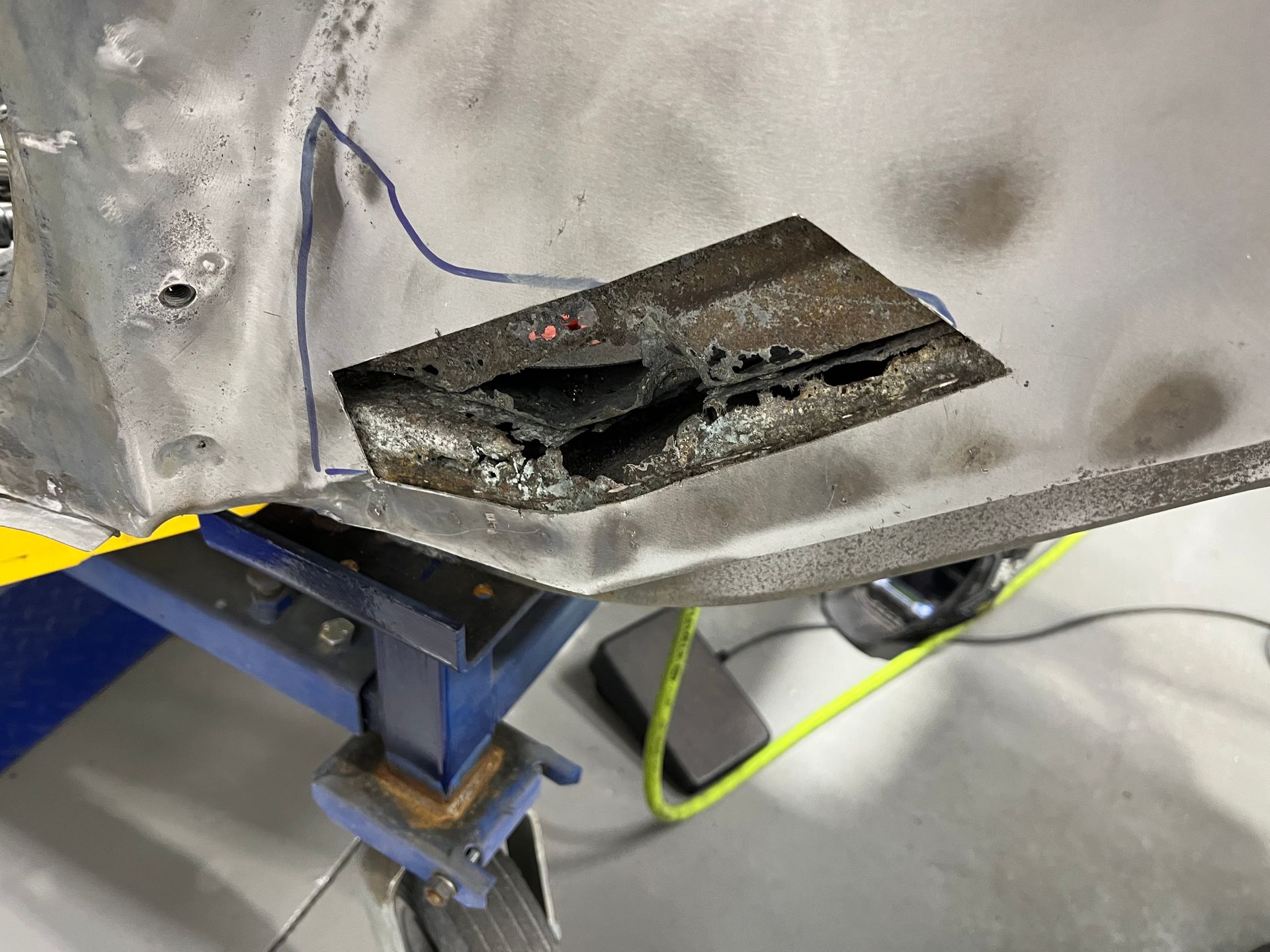 A piece of metal with a hole in it is sitting on a table.