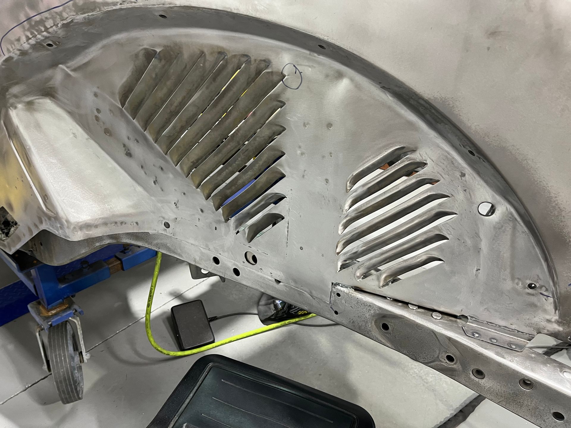 A close up of a piece of metal with a fan on it.