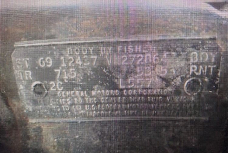 A close up of a license plate on a car.