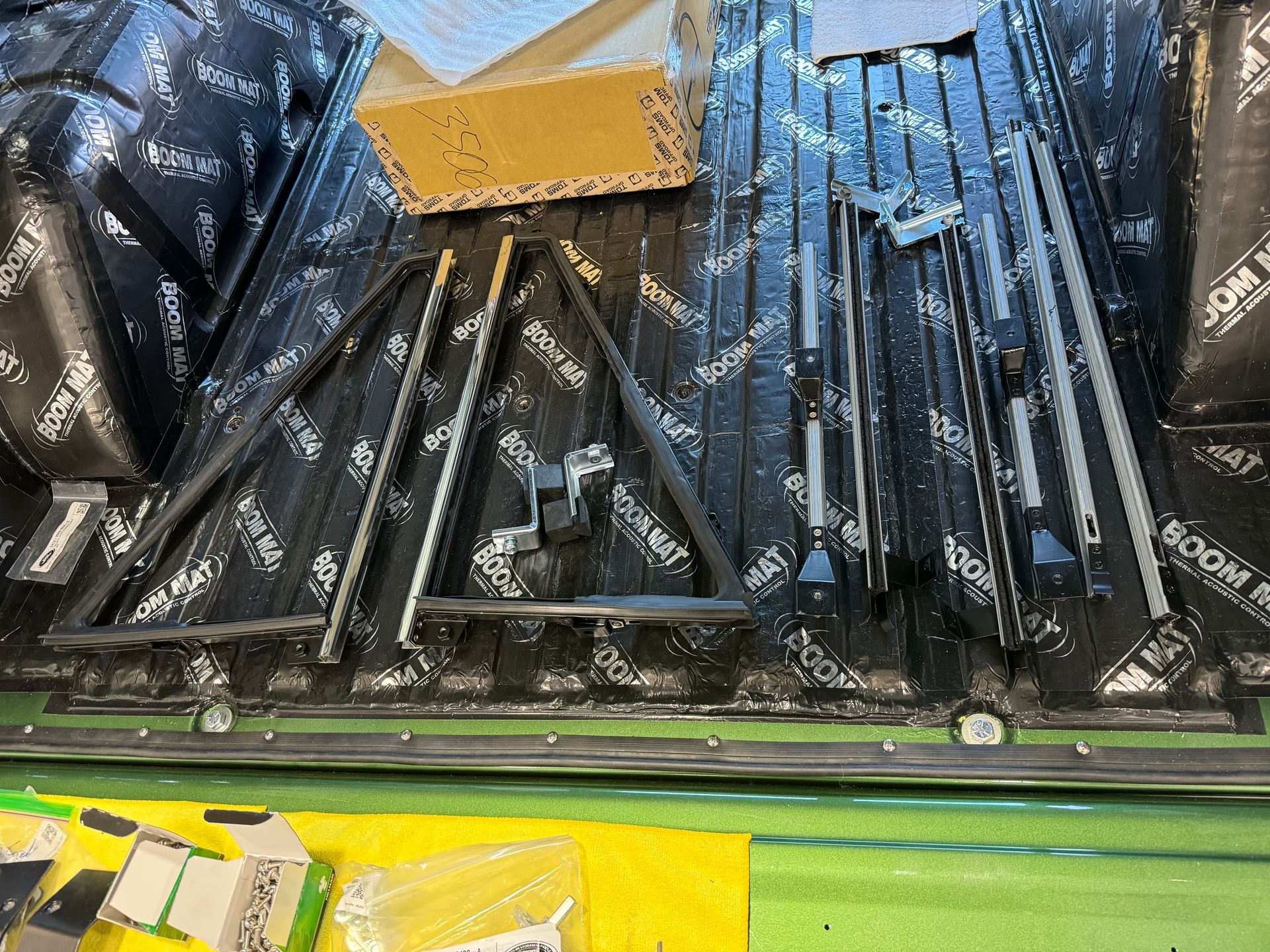 The back of a truck with a bunch of tools in it.