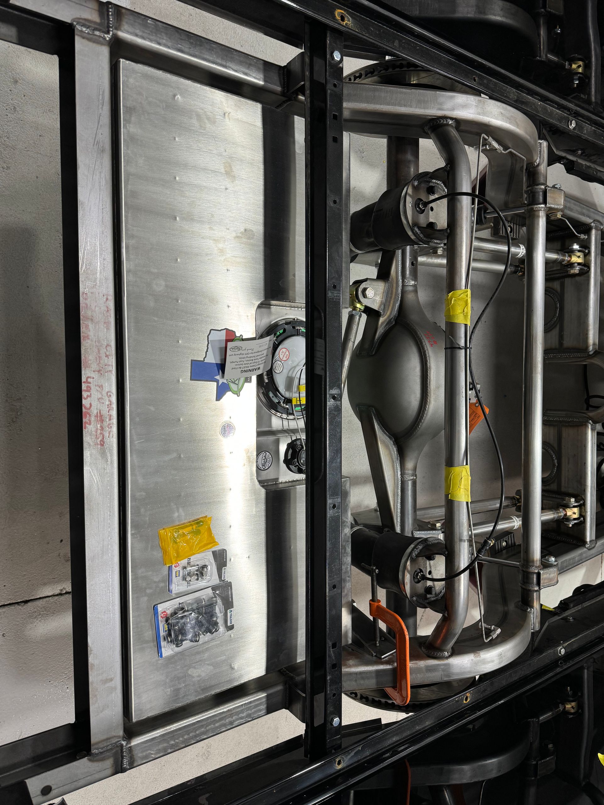 A close up of a metal frame of a vehicle.