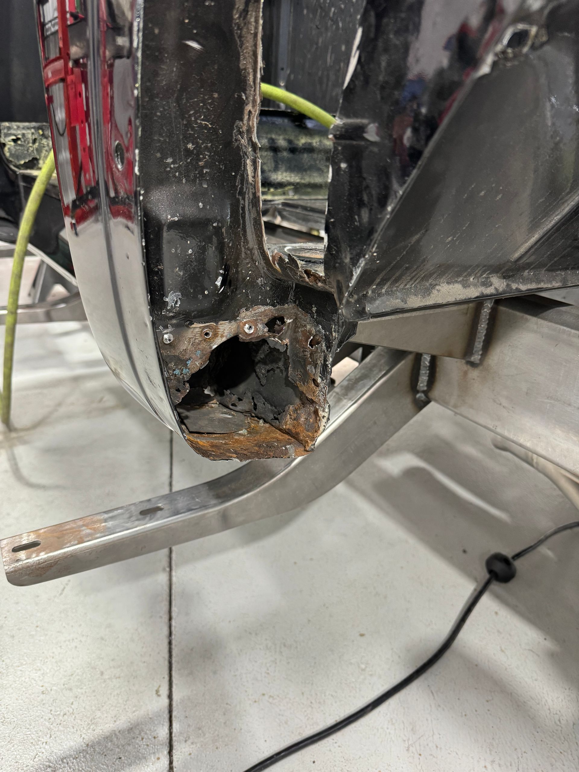 A close up of a car with a hole in it