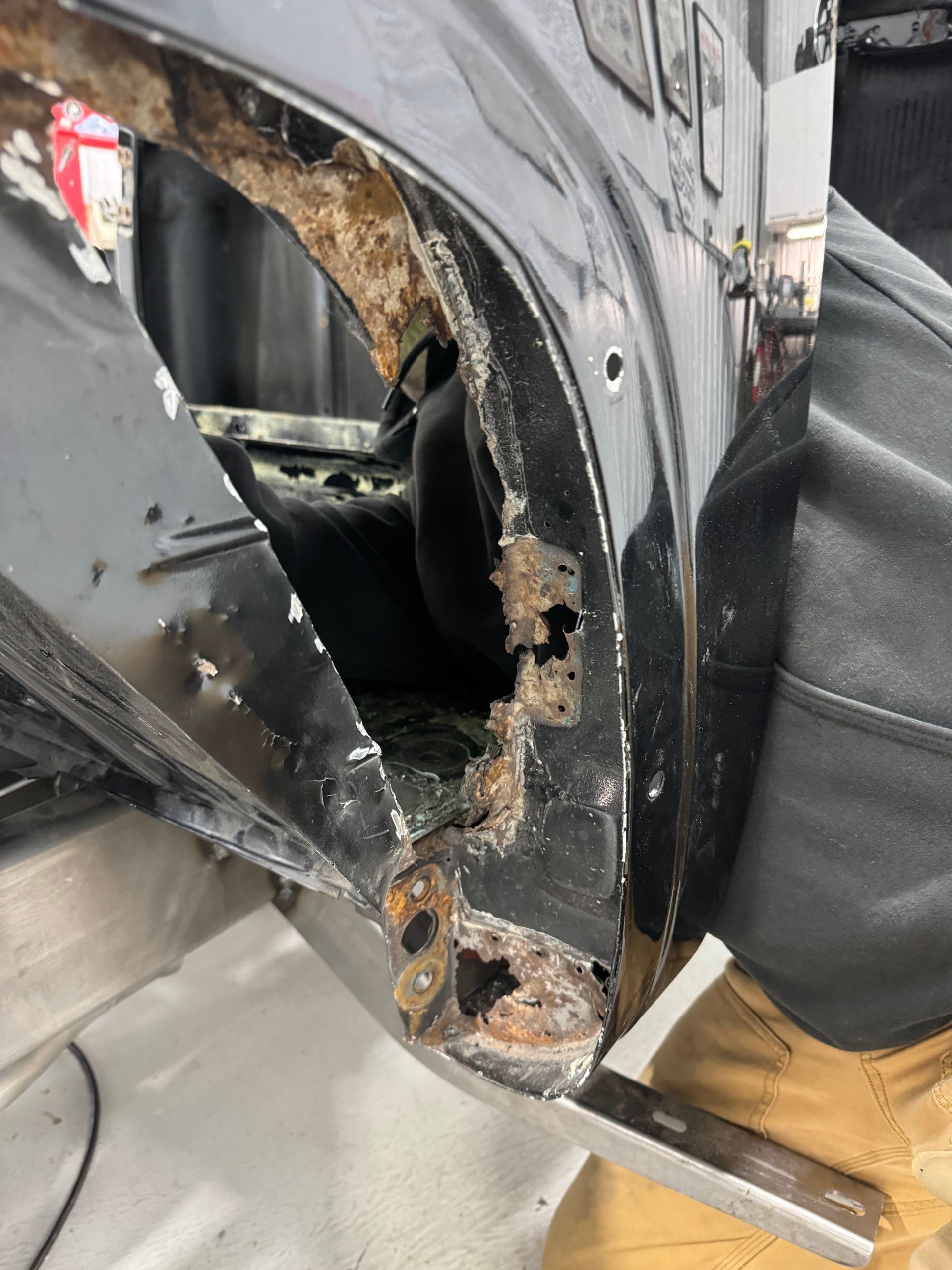 A close up of a car with a hole in it