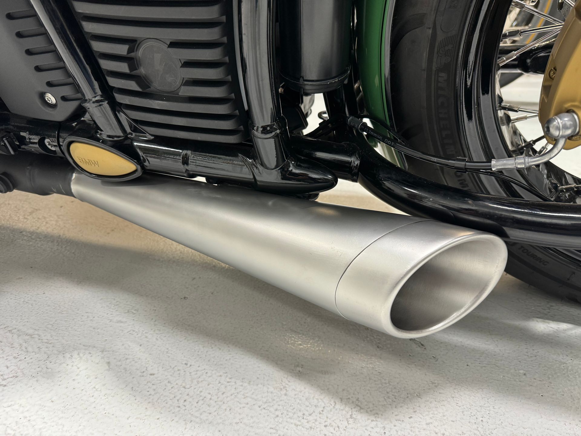 A close up of a motorcycle exhaust pipe