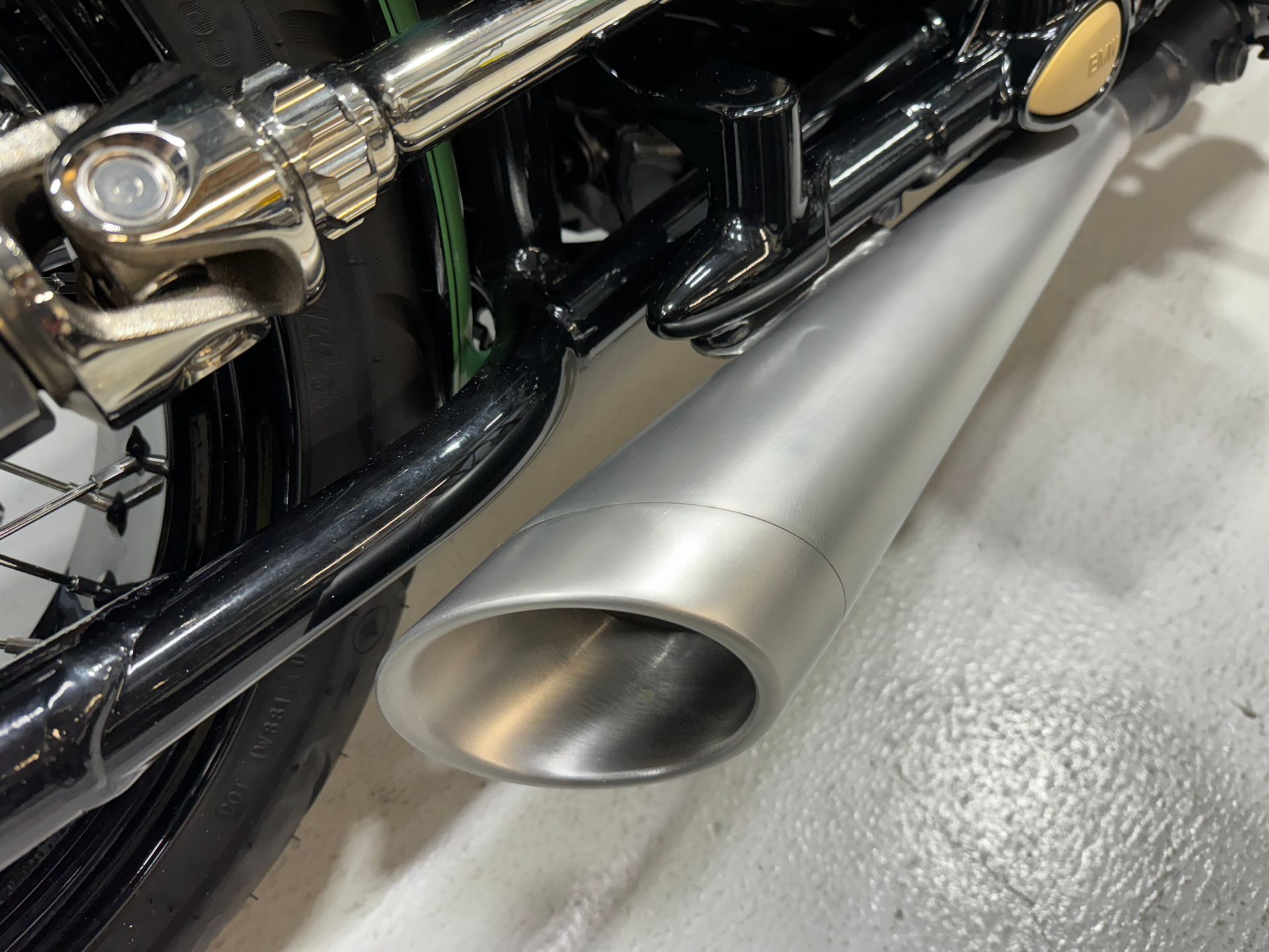 A close up of a motorcycle exhaust pipe