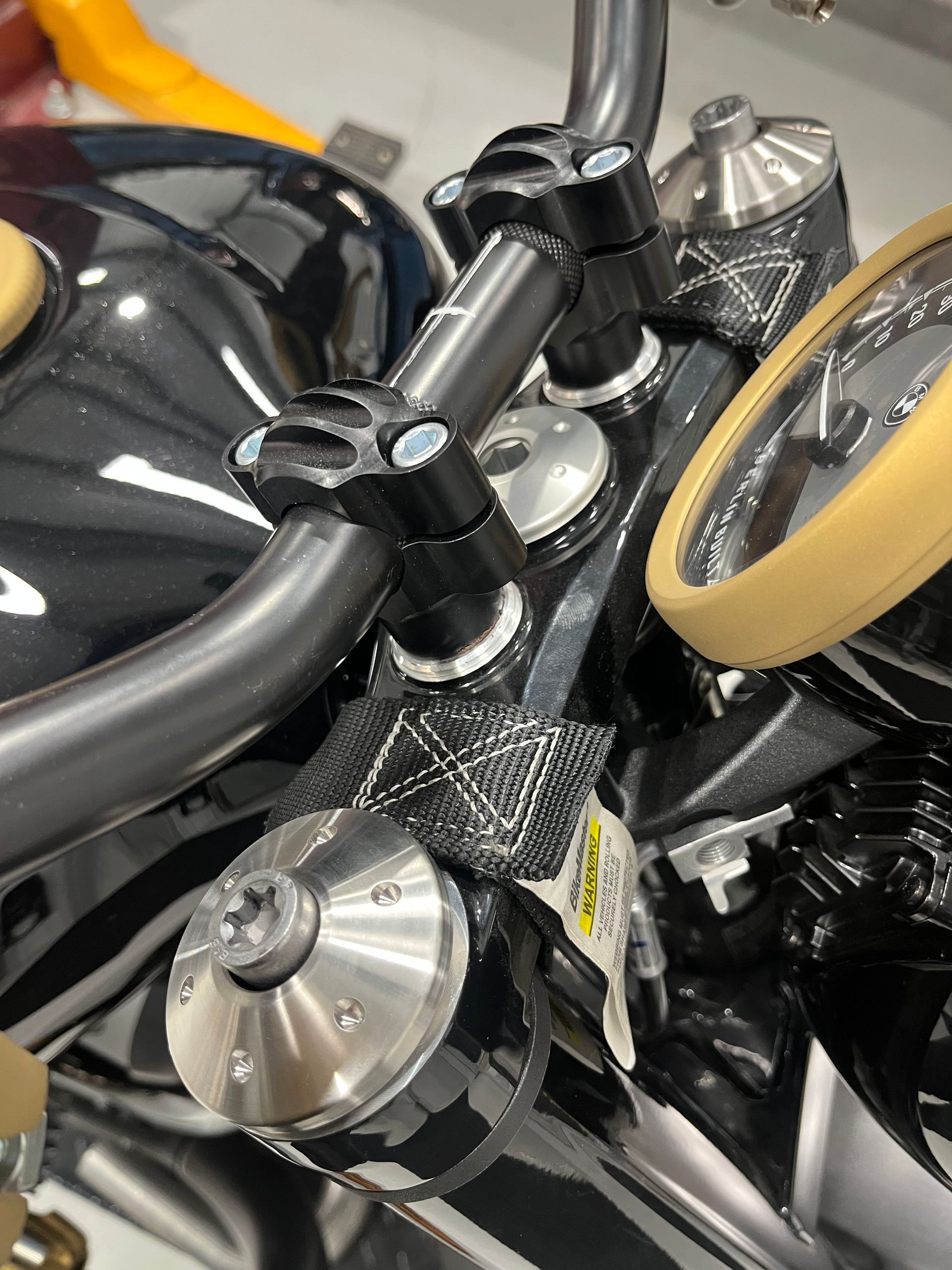 A close up of a motorcycle with a tachometer on it