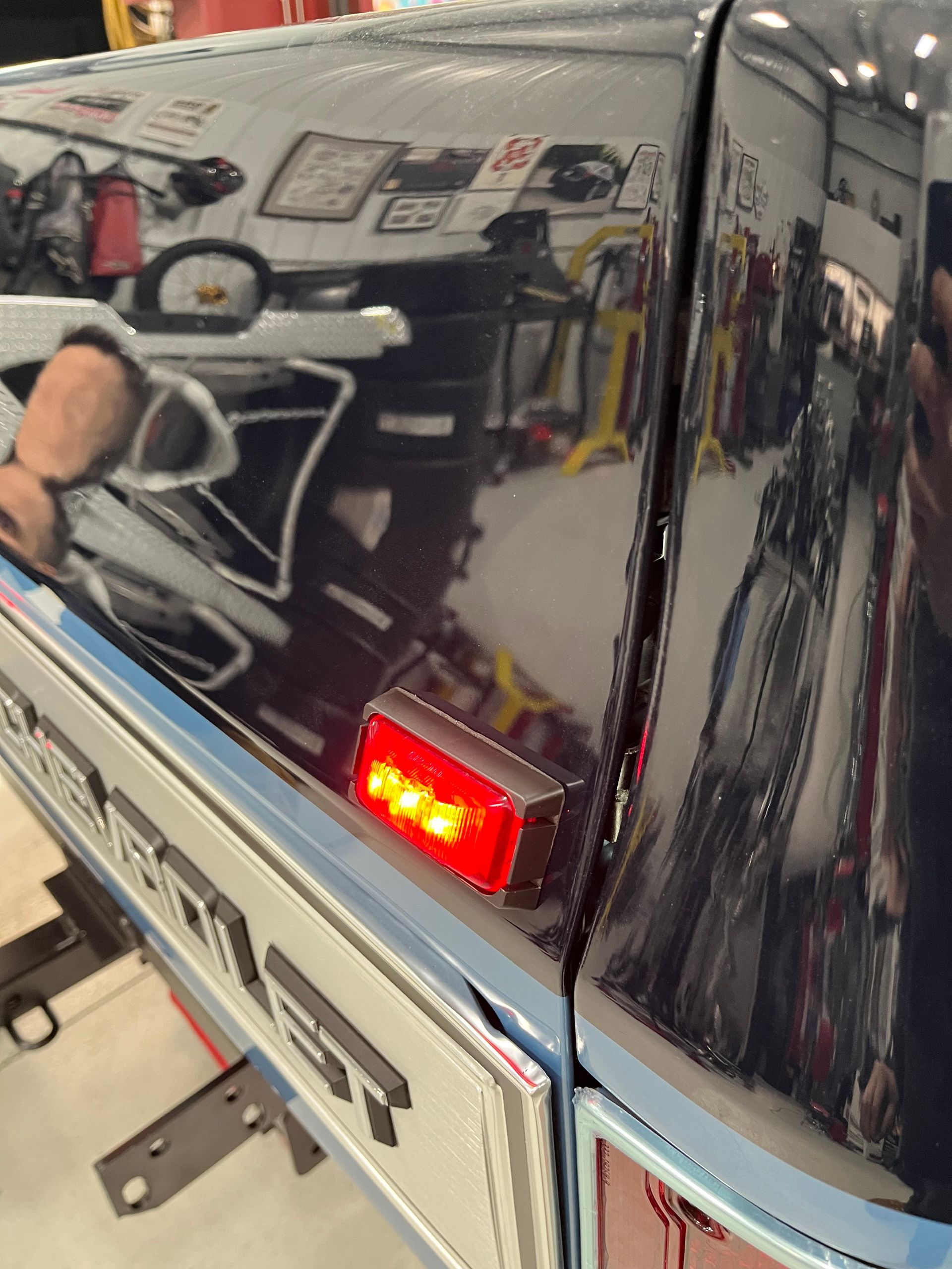 A close up of the back of a ford truck