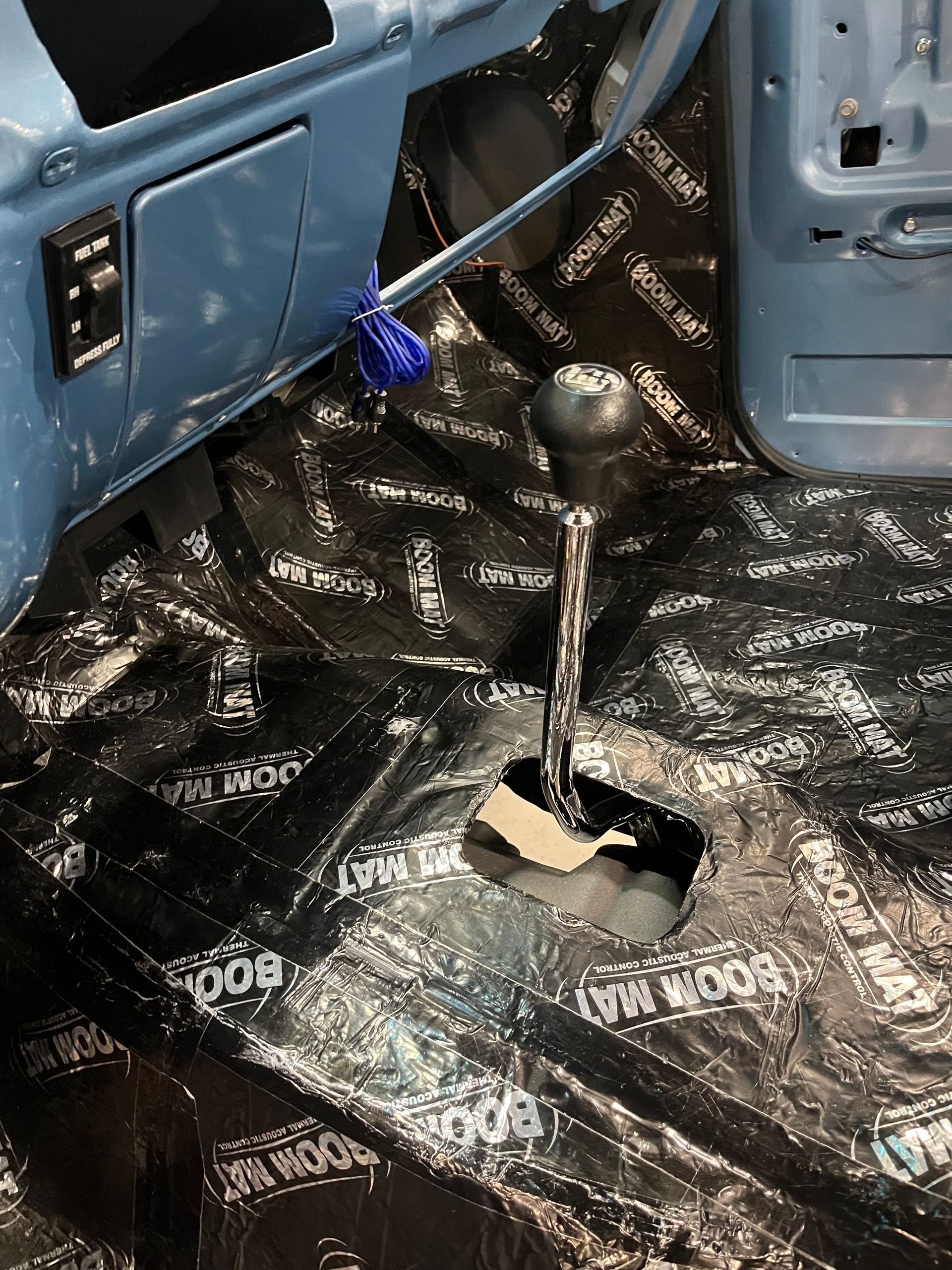 A close up of a shifter in a car