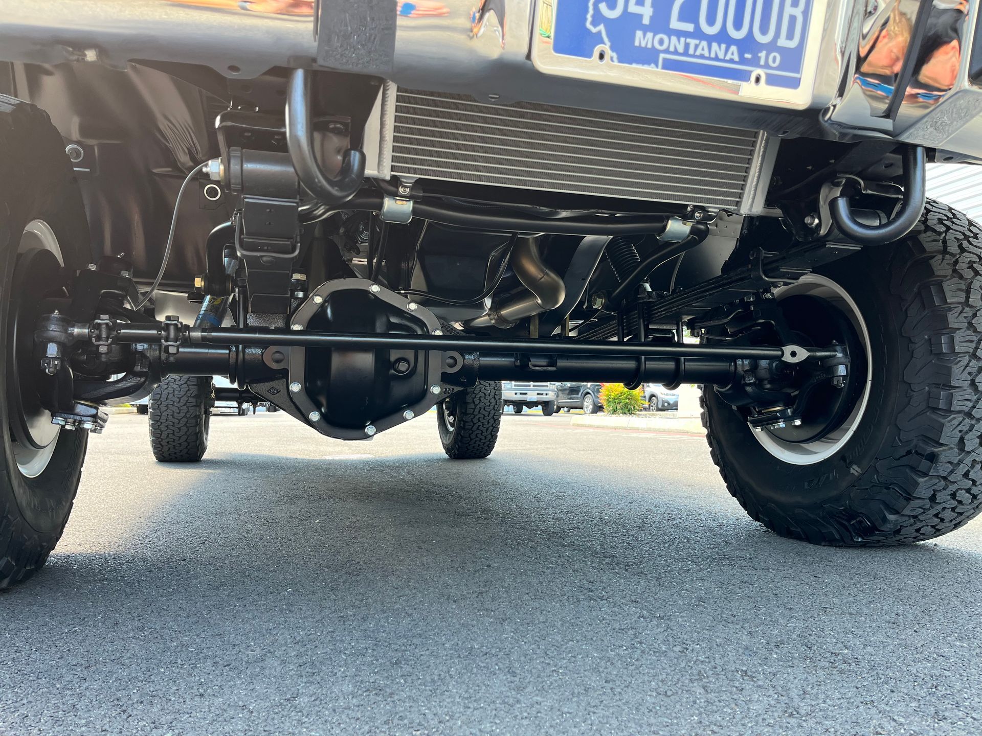 A montana license plate is on the back of a truck.