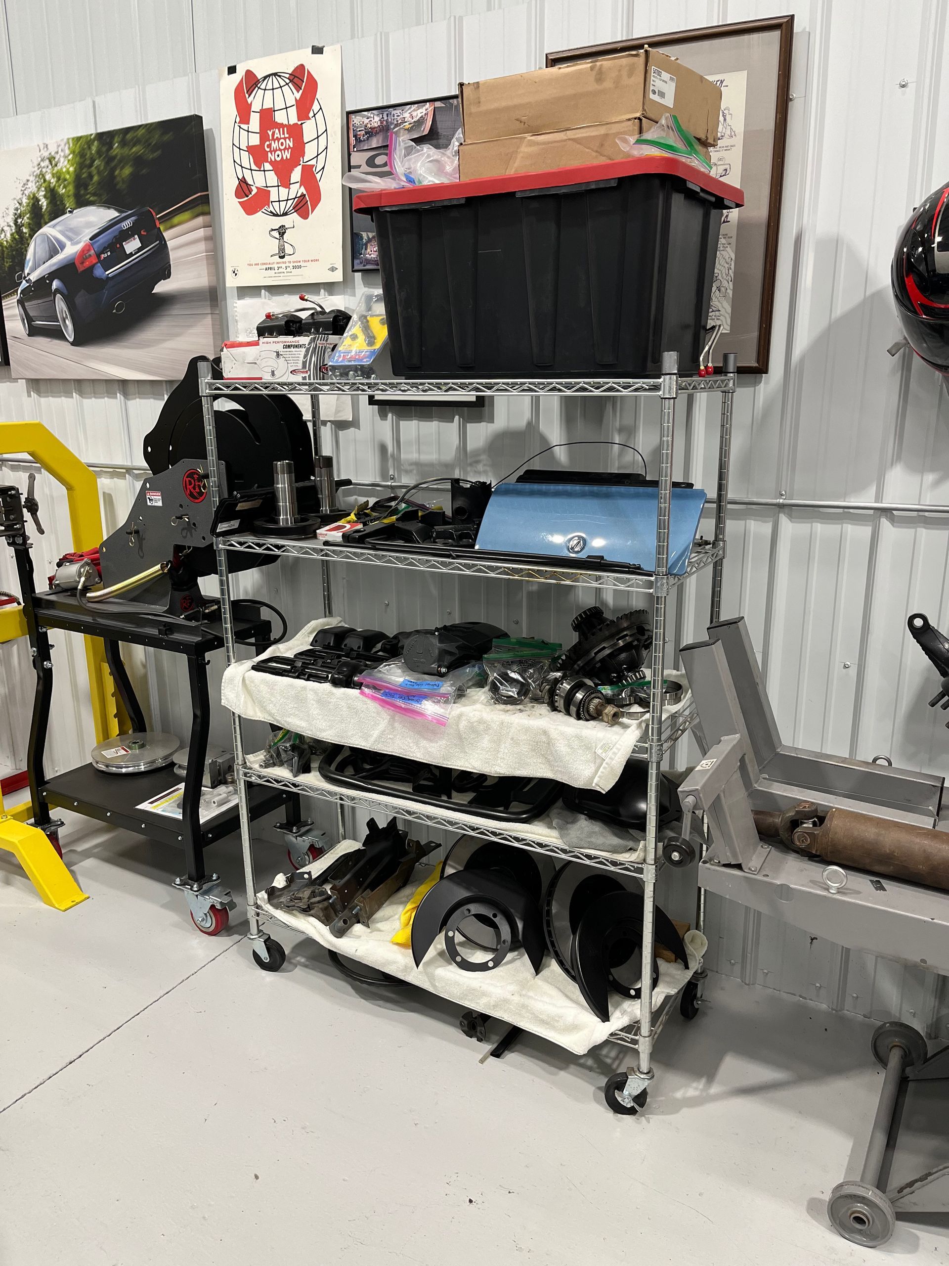 A room with a lot of shelves and boxes on them.