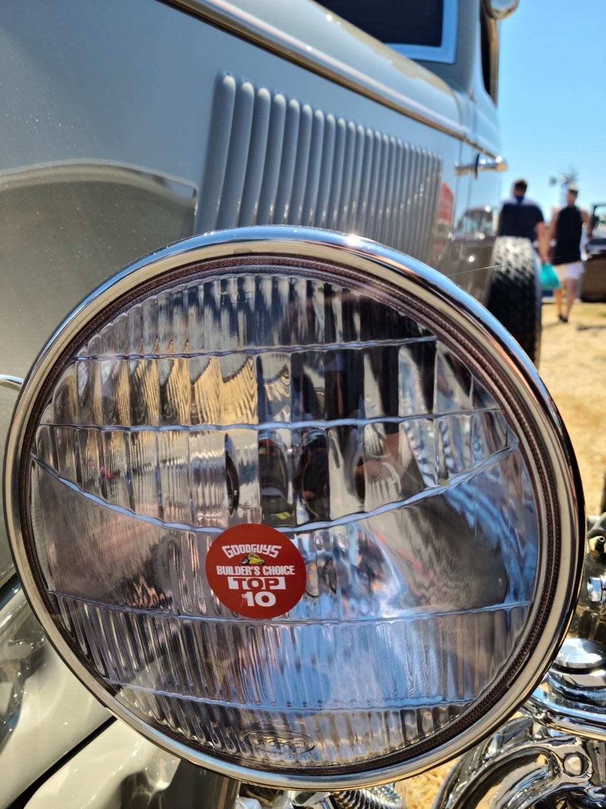 A close up of a headlight on a car.