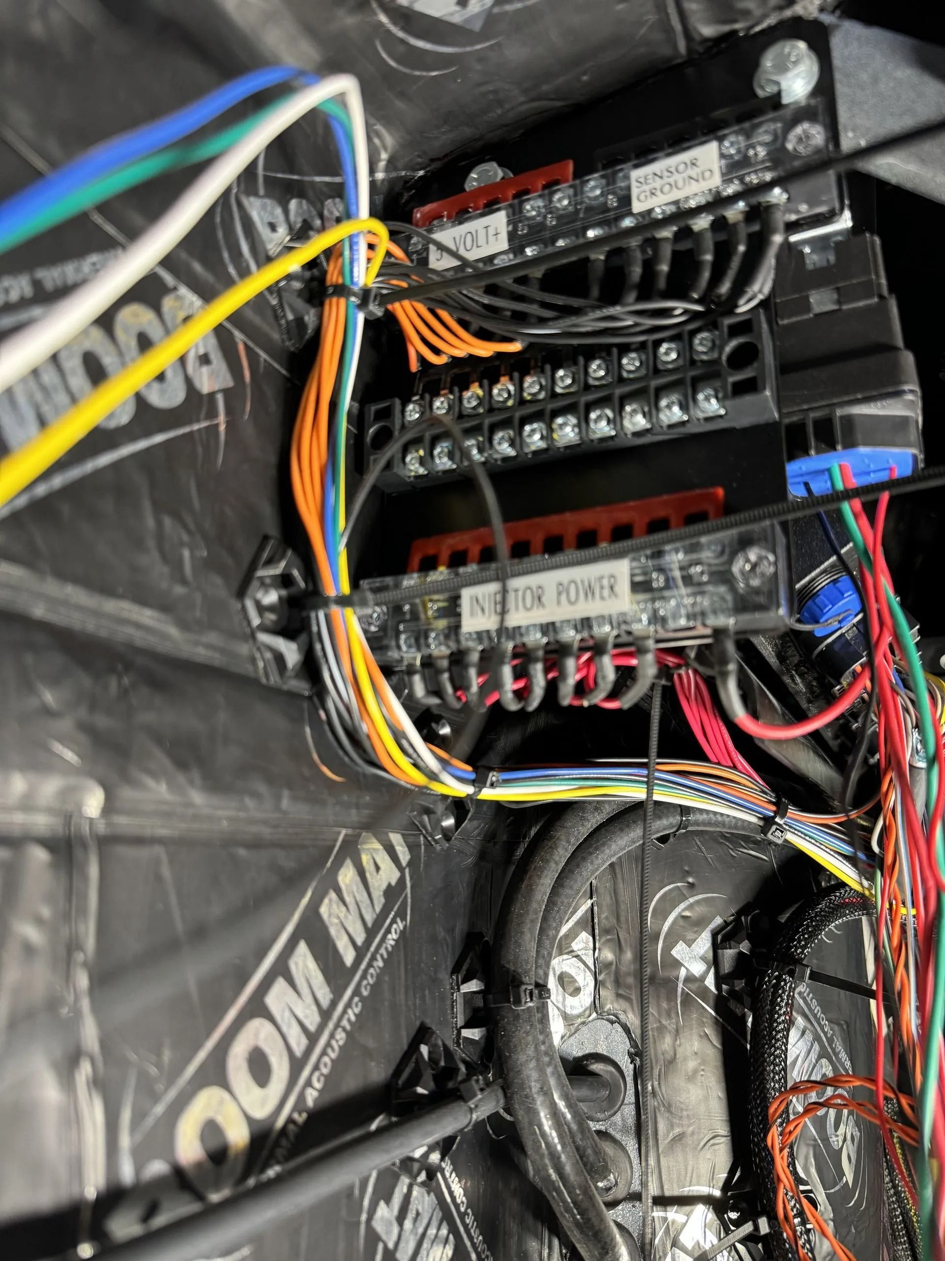 A bunch of wires are connected to a box that says motor power
