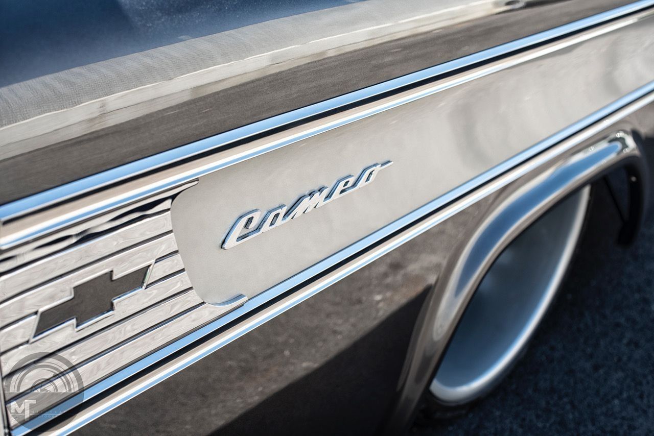 A close up of the side of a chevrolet impala