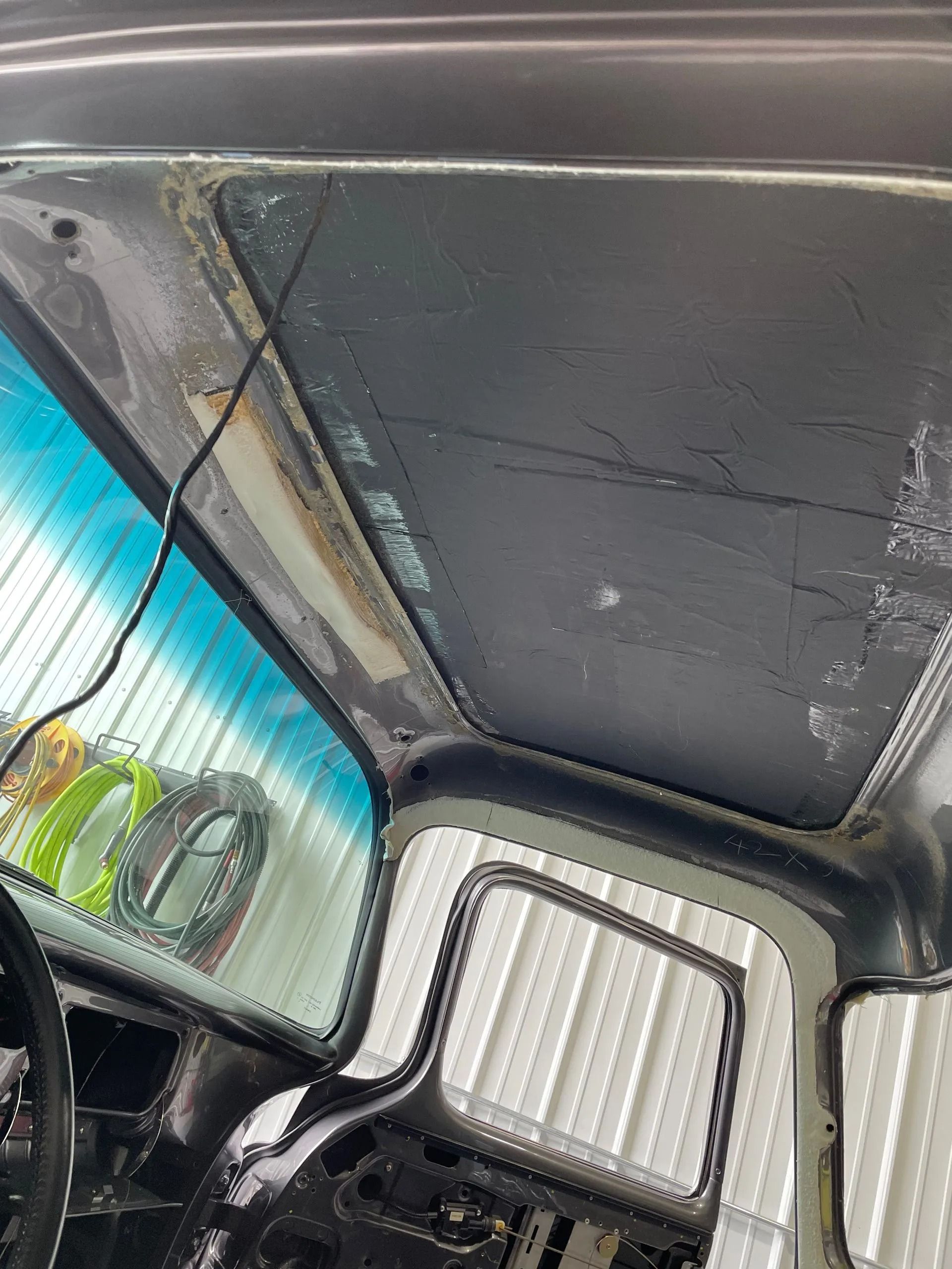 A close up of the roof of a car.