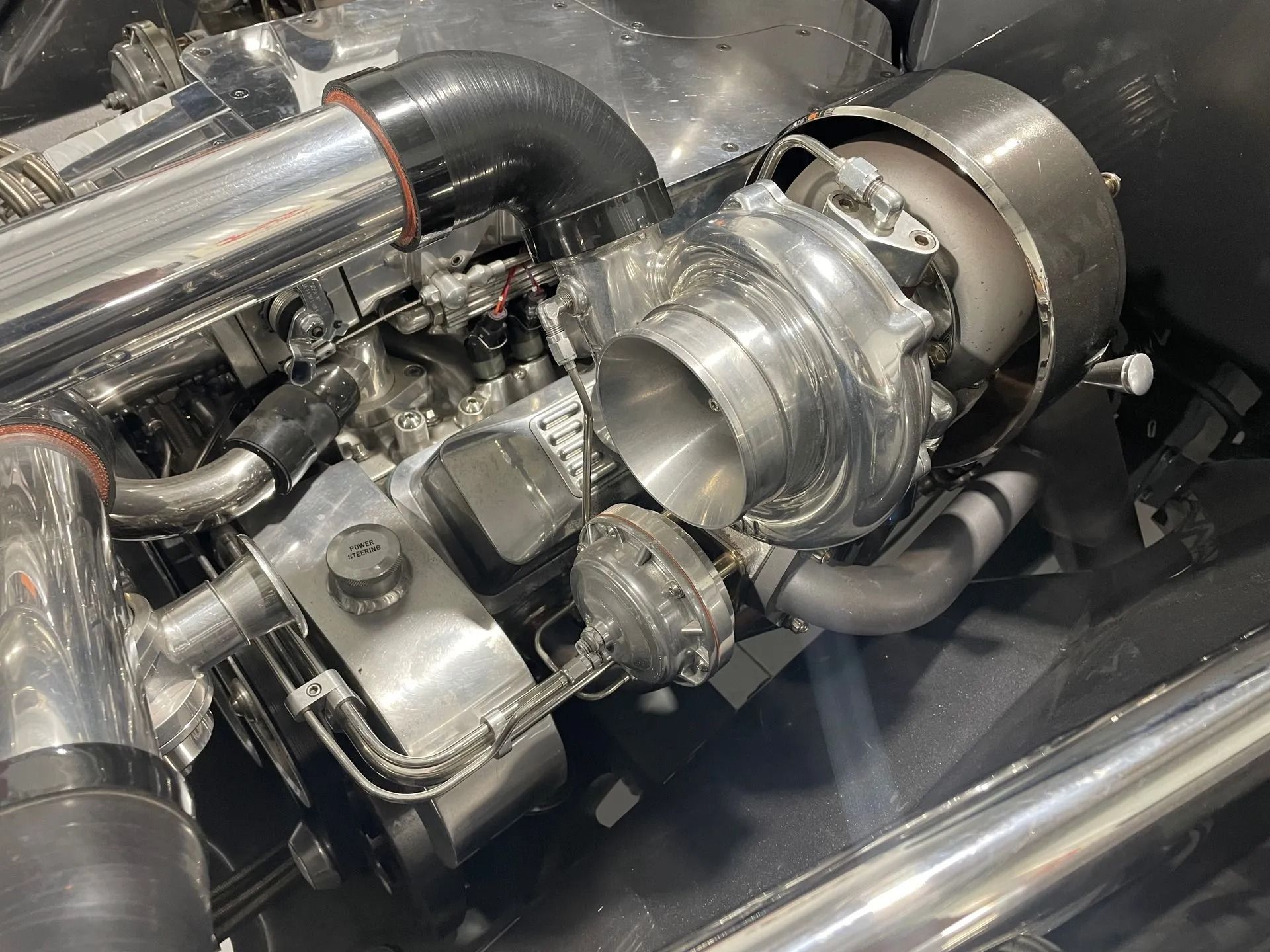 A close up of a turbocharger in a car engine