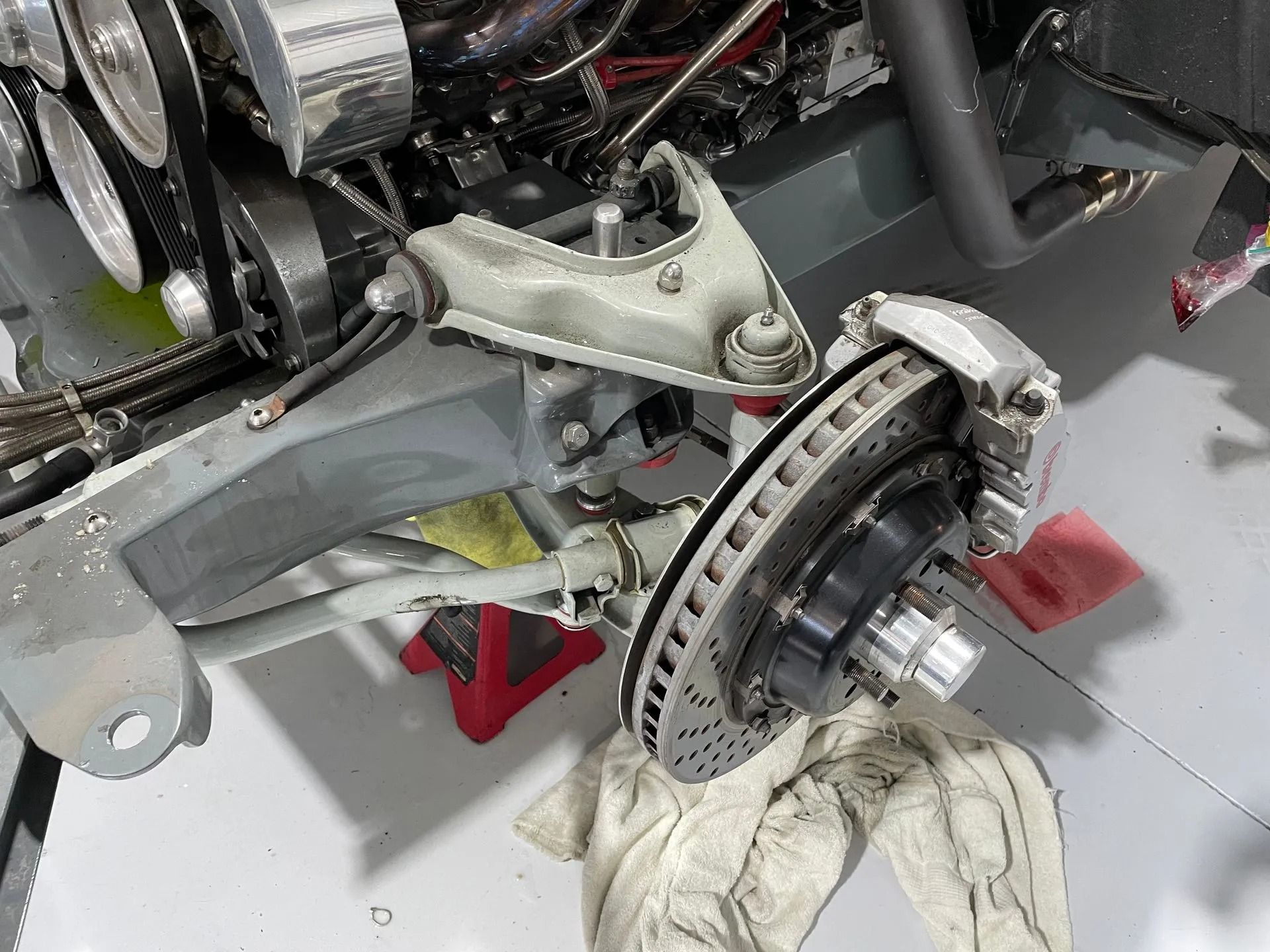 A close up of a brake disc on a car.