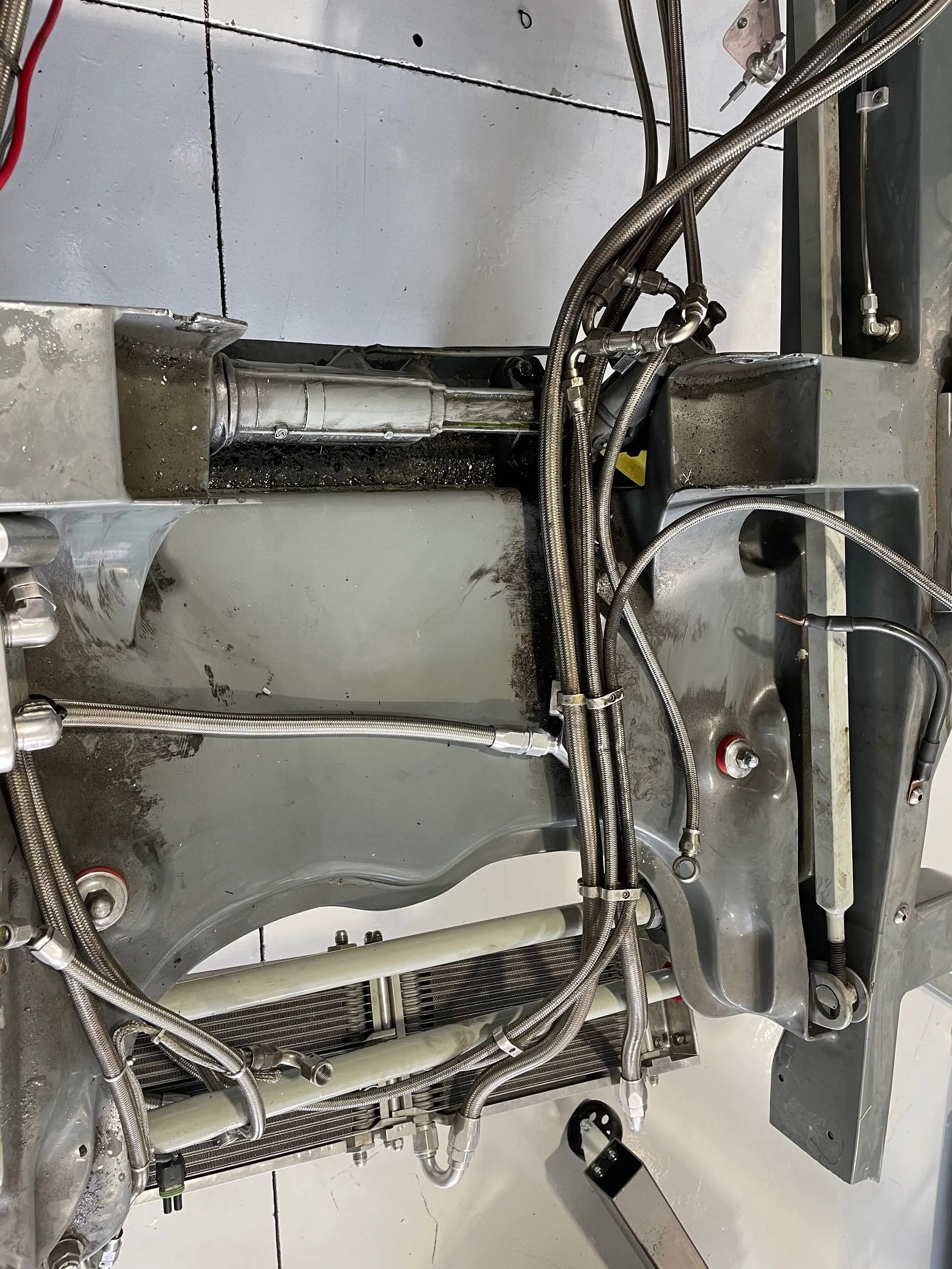 A close up of a machine with a lot of wires coming out of it.