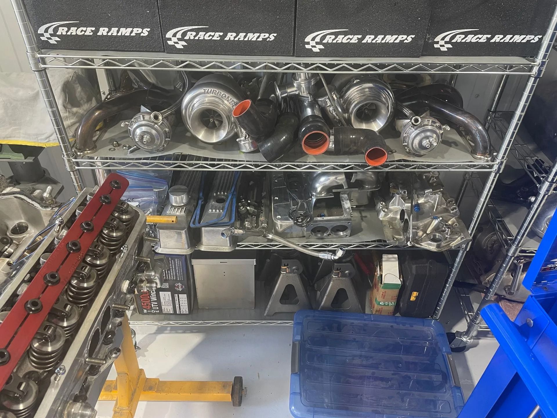 A shelf filled with a variety of race ramps products