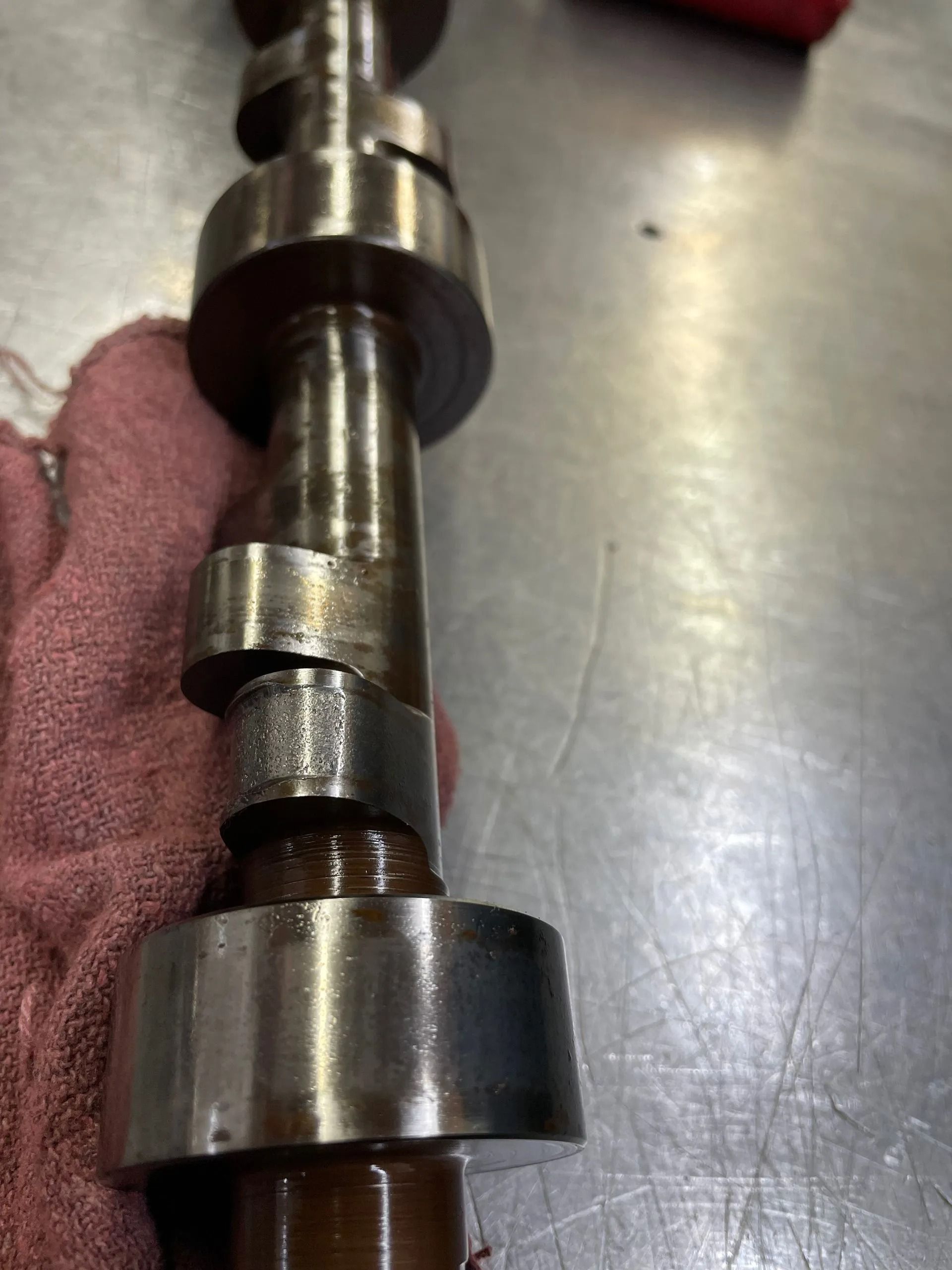 A close up of a metal object on a table.