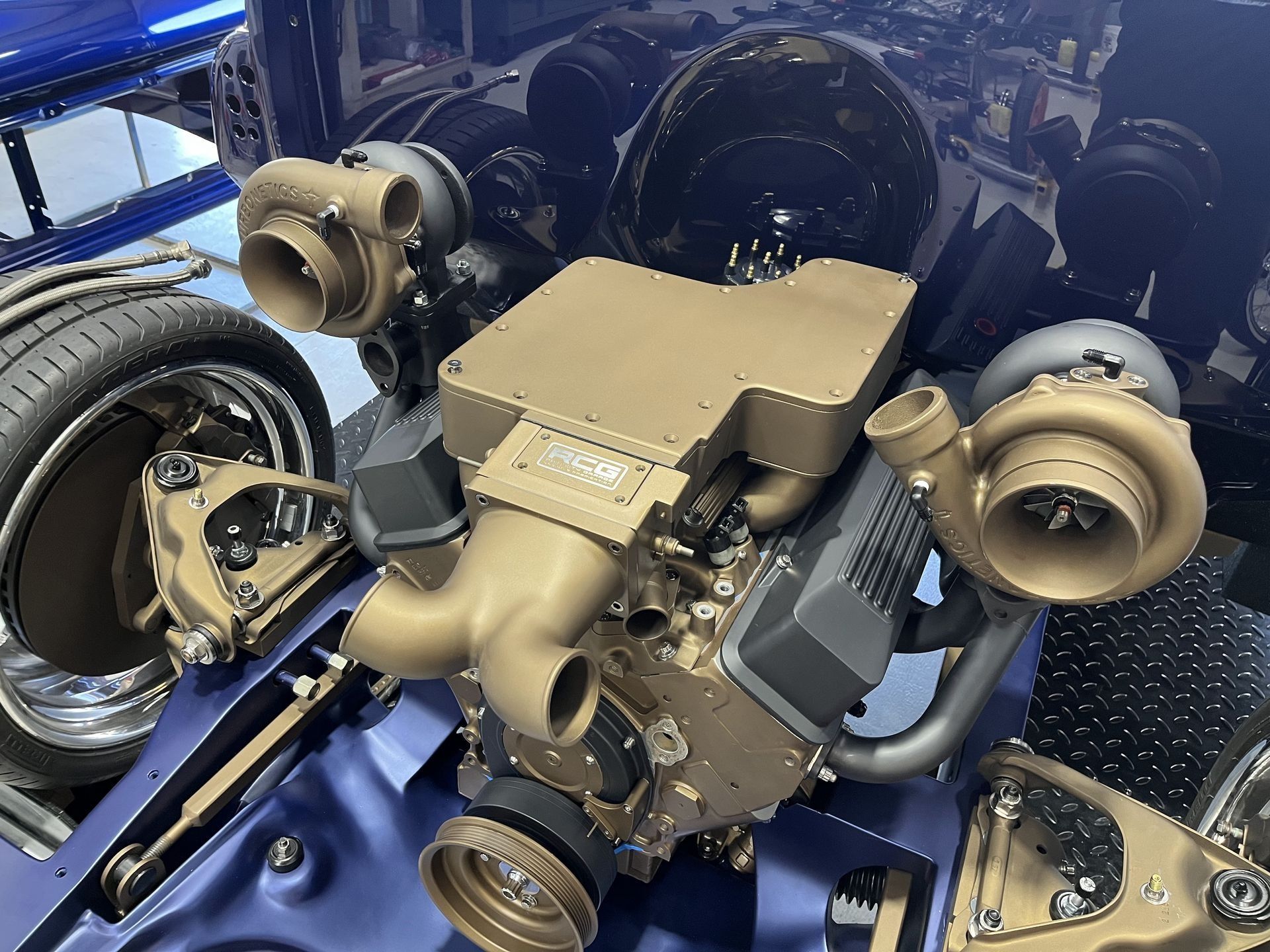 A close up of a car engine with two turbochargers