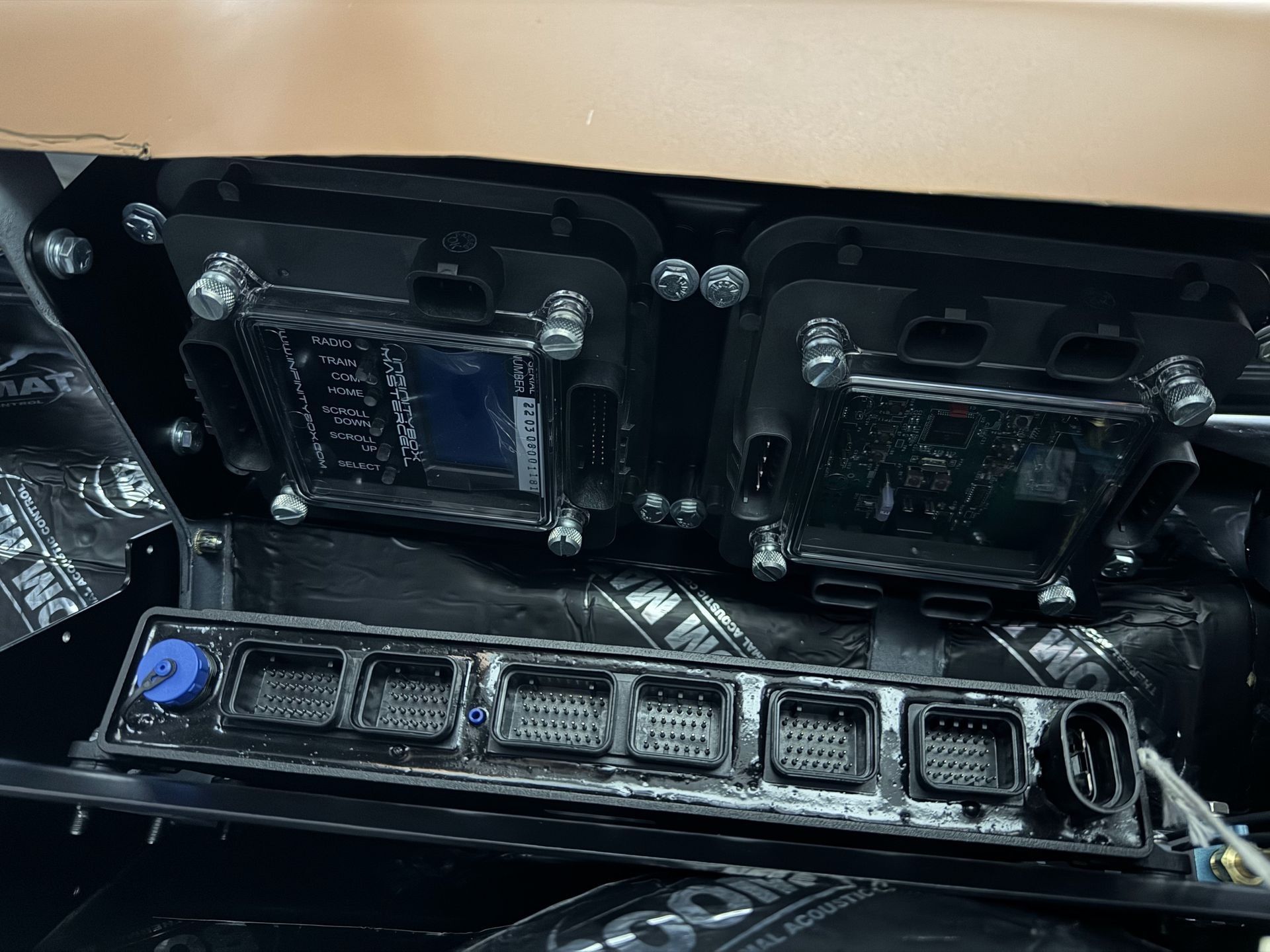 A close up of a dashboard with a blue button on it