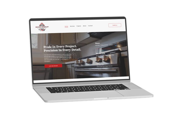 Laptop displaying a website with a kitchen image, showcasing design and services.
